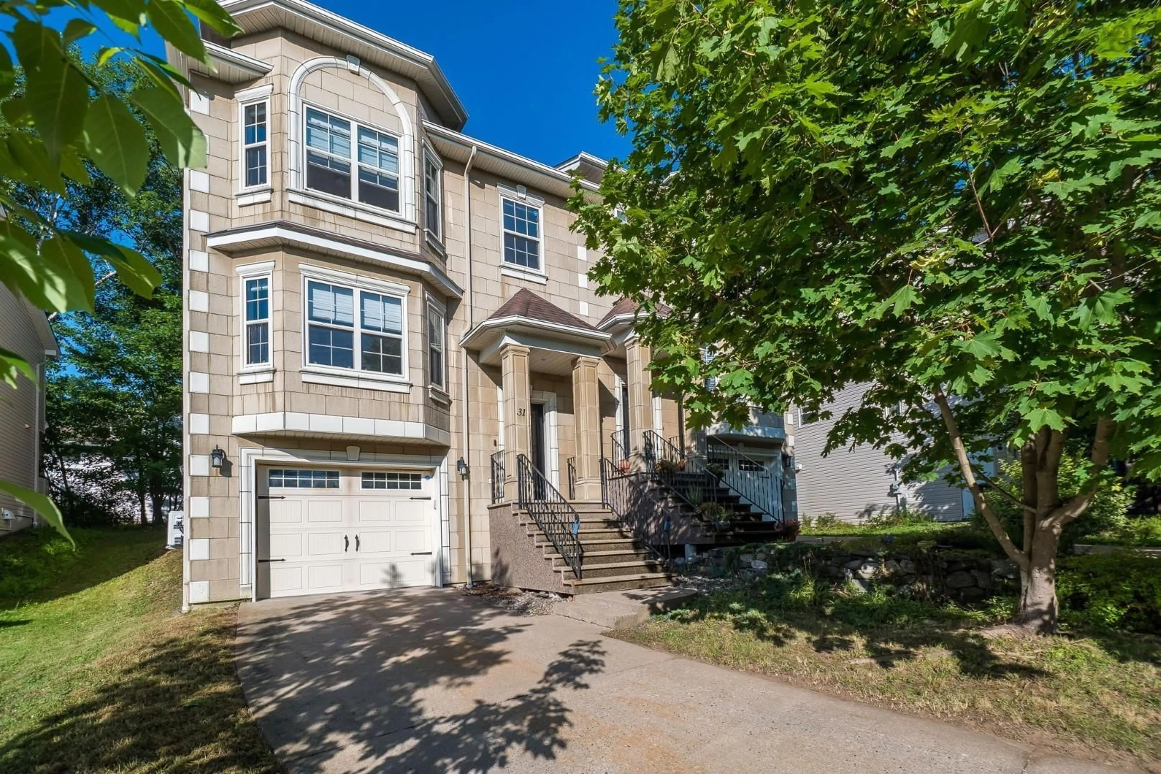 Home with vinyl exterior material, street for 31 Sagewood Lane, Halifax Nova Scotia B3P 0B8