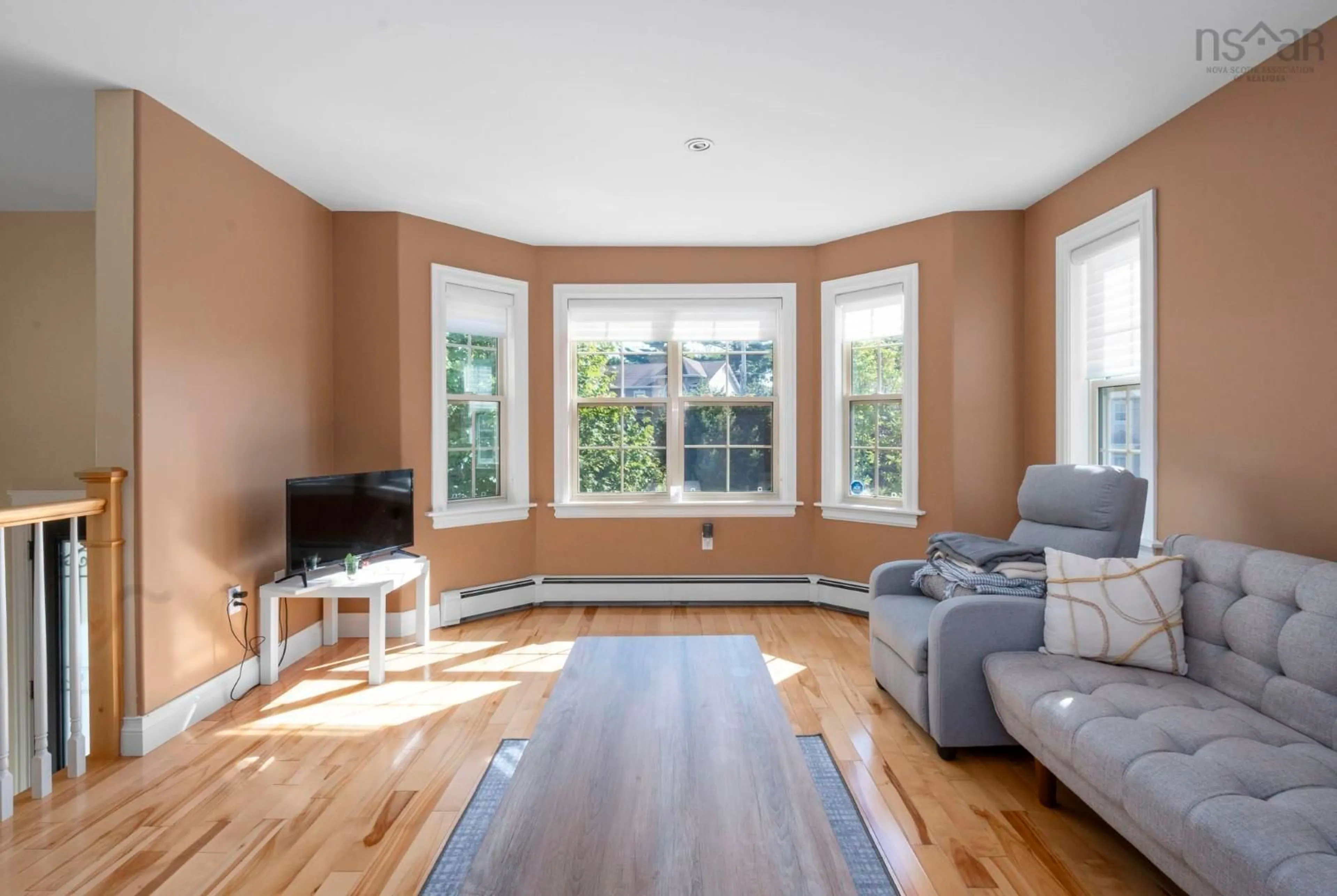 Living room with furniture, wood/laminate floor for 31 Sagewood Lane, Halifax Nova Scotia B3P 0B8