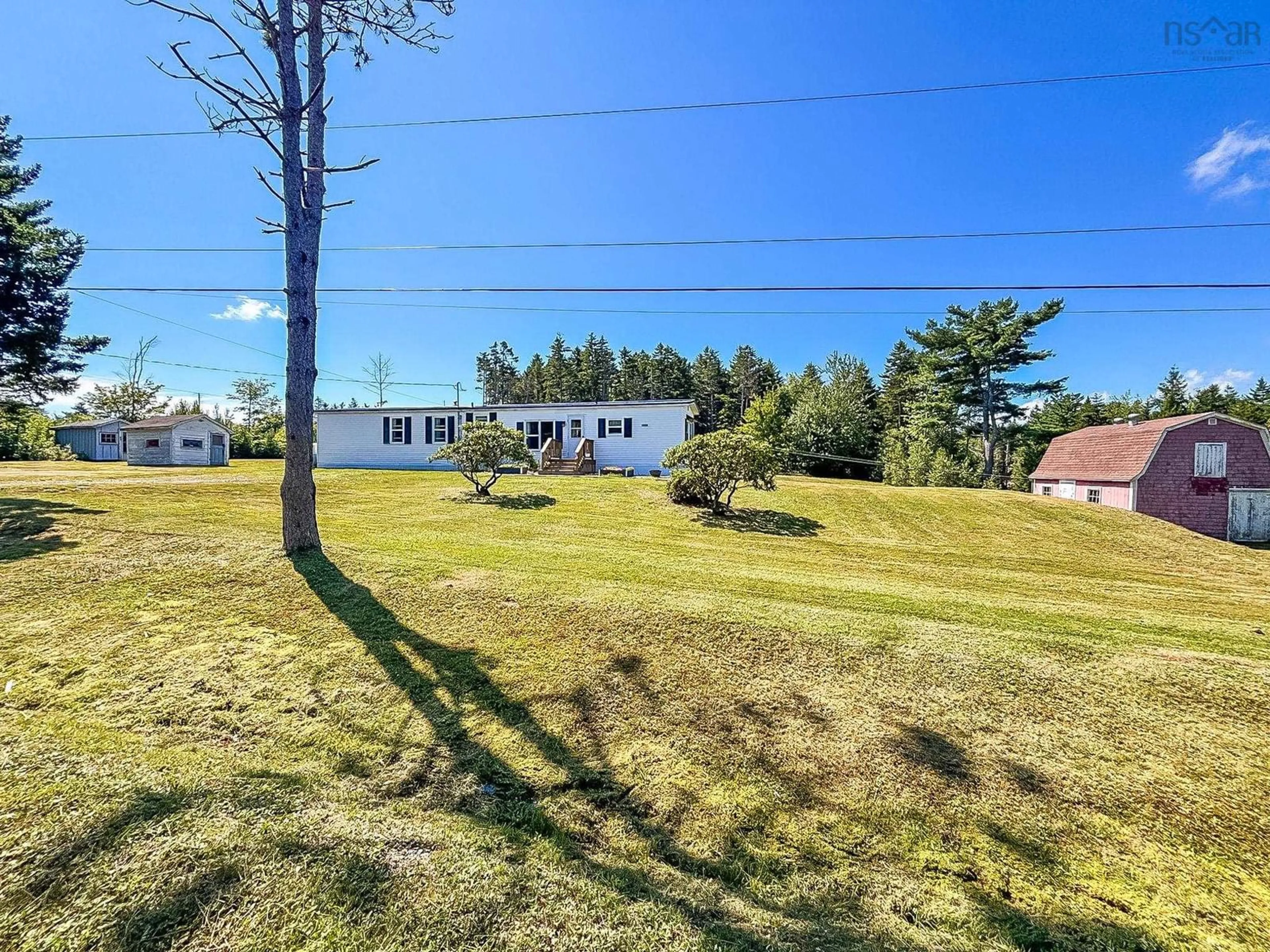 A pic from outside/outdoor area/front of a property/back of a property/a pic from drone, water/lake/river/ocean view for 1388 New Cumberland Rd, Lake Centre Nova Scotia B0R 1G0