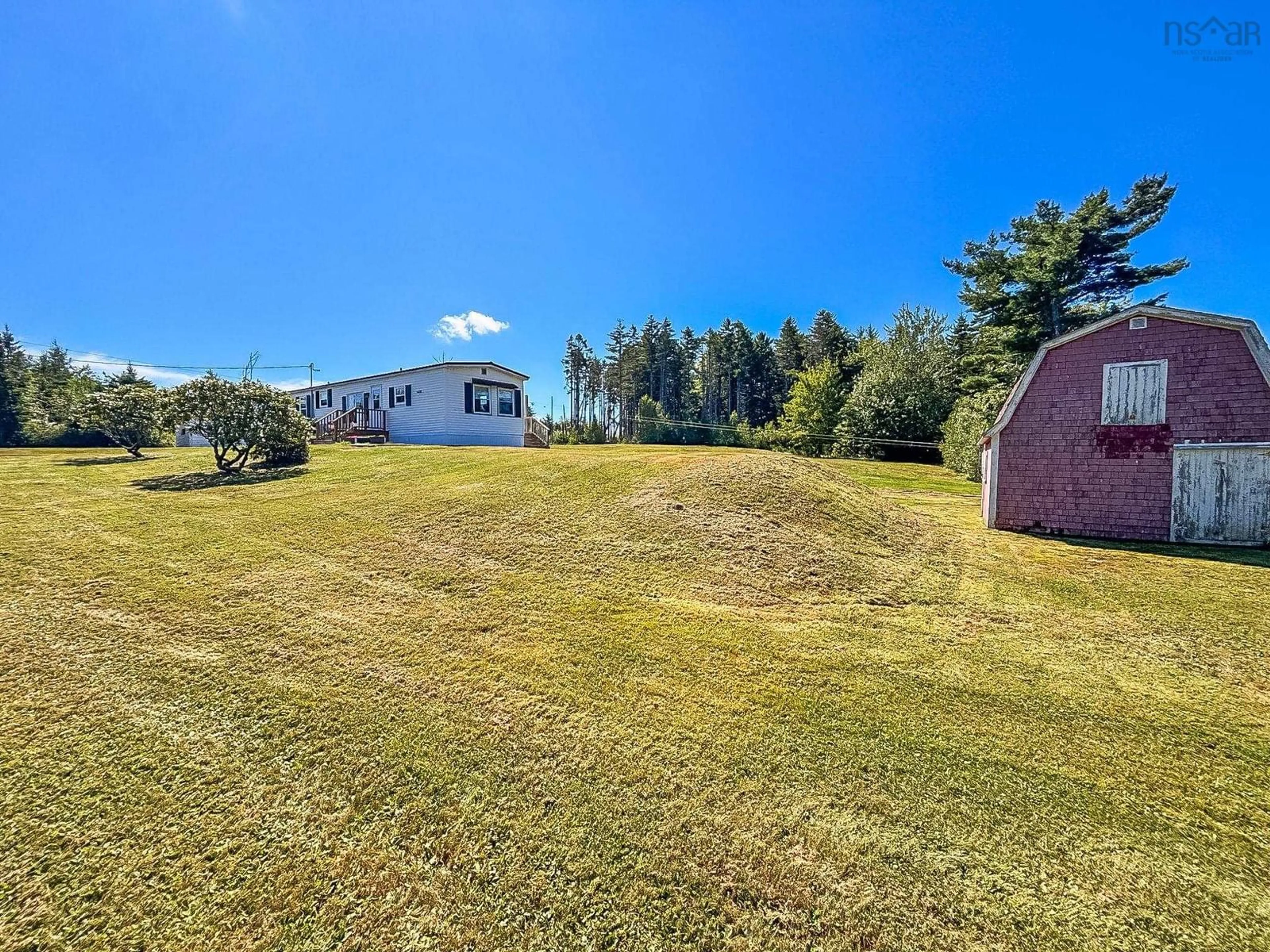 A pic from outside/outdoor area/front of a property/back of a property/a pic from drone, water/lake/river/ocean view for 1388 New Cumberland Rd, Lake Centre Nova Scotia B0R 1G0