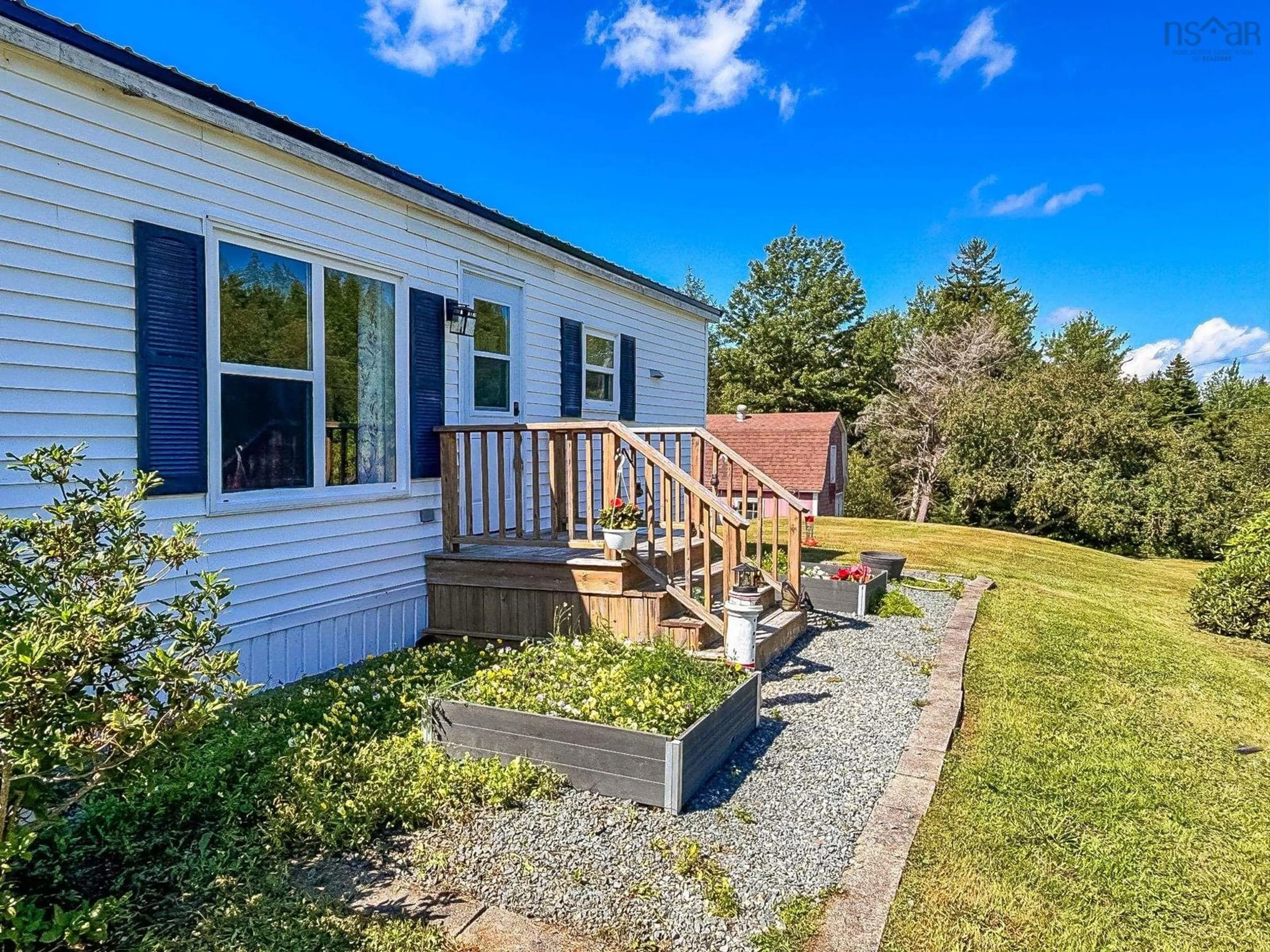 A pic from outside/outdoor area/front of a property/back of a property/a pic from drone, water/lake/river/ocean view for 1388 New Cumberland Rd, Lake Centre Nova Scotia B0R 1G0