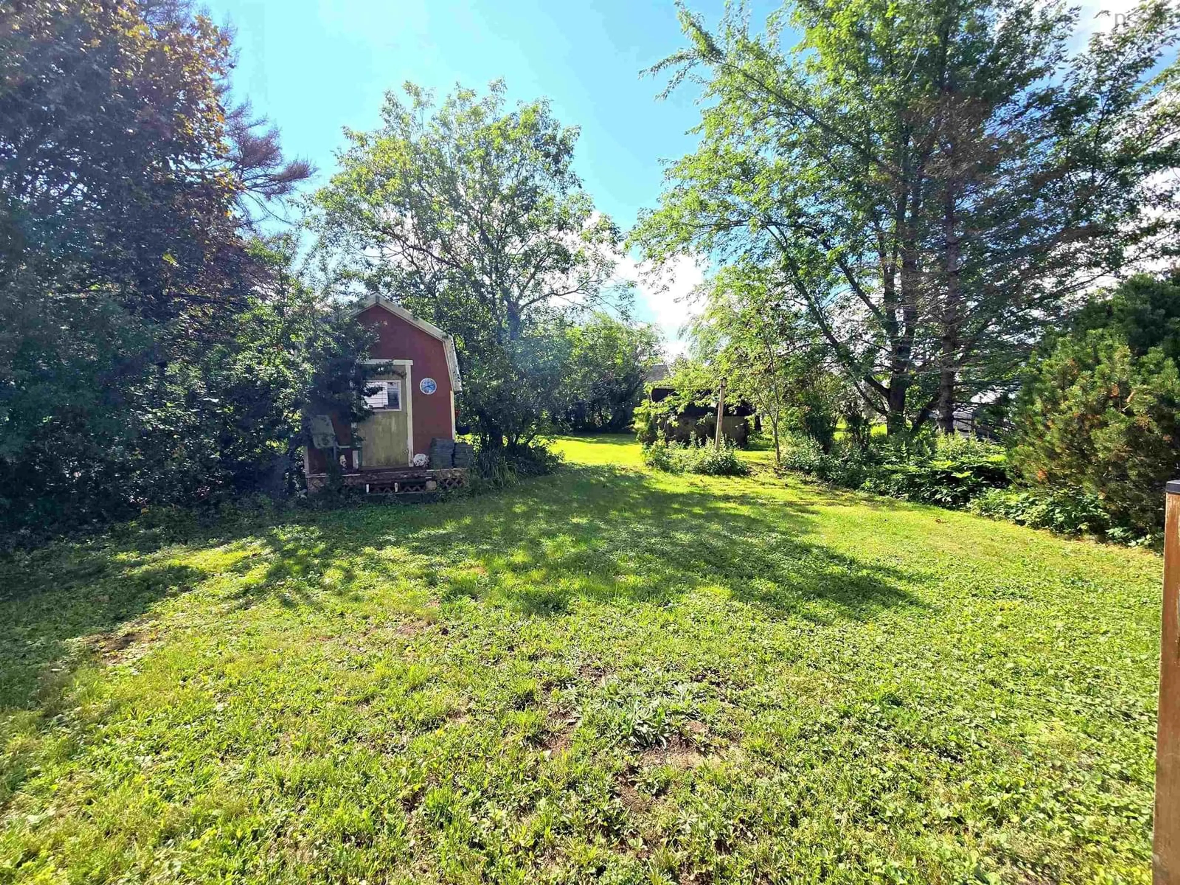 A pic from outside/outdoor area/front of a property/back of a property/a pic from drone, forest/trees view for 35 Maple St, Springhill Nova Scotia B0M 1X0