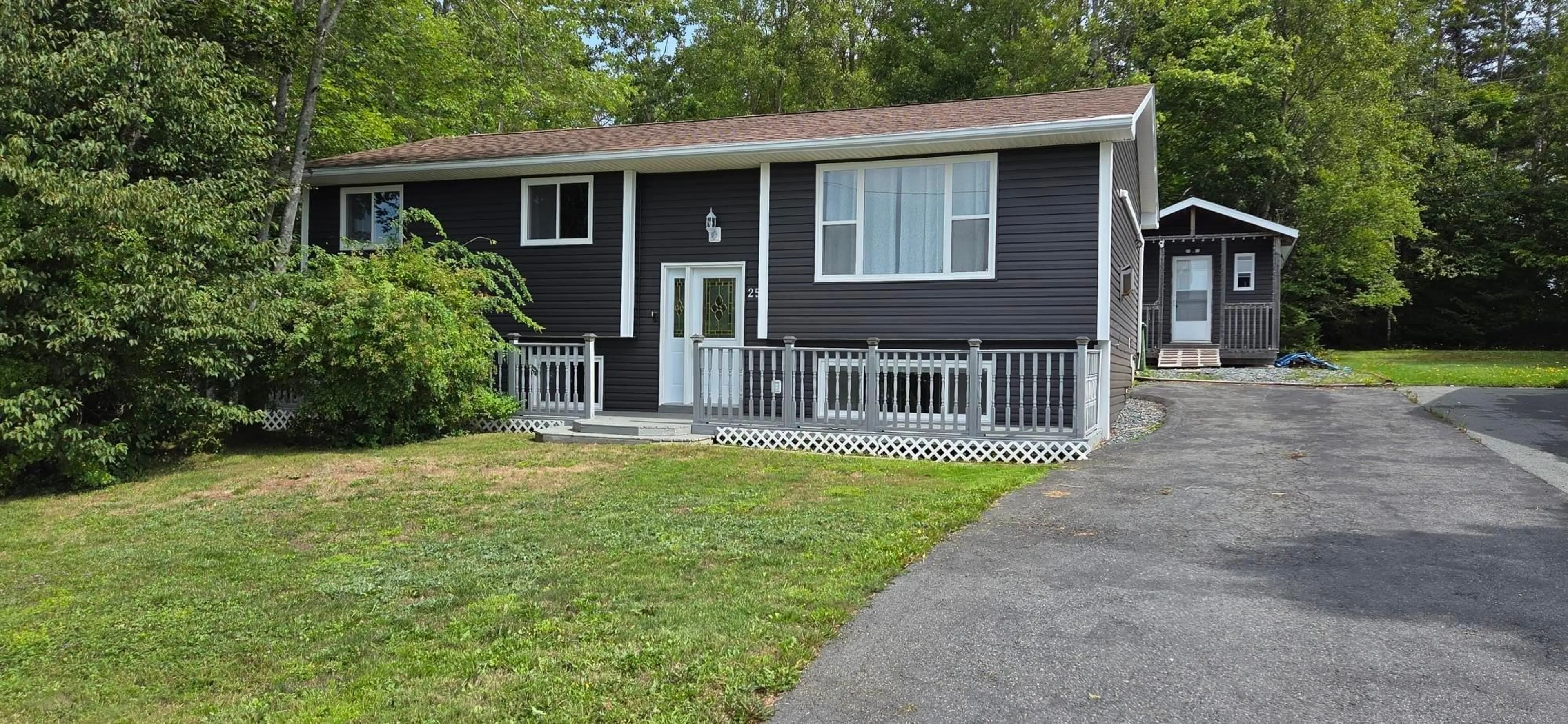 Home with vinyl exterior material, street for 25 Saturn Dr, Lower Sackville Nova Scotia B4C 2V6
