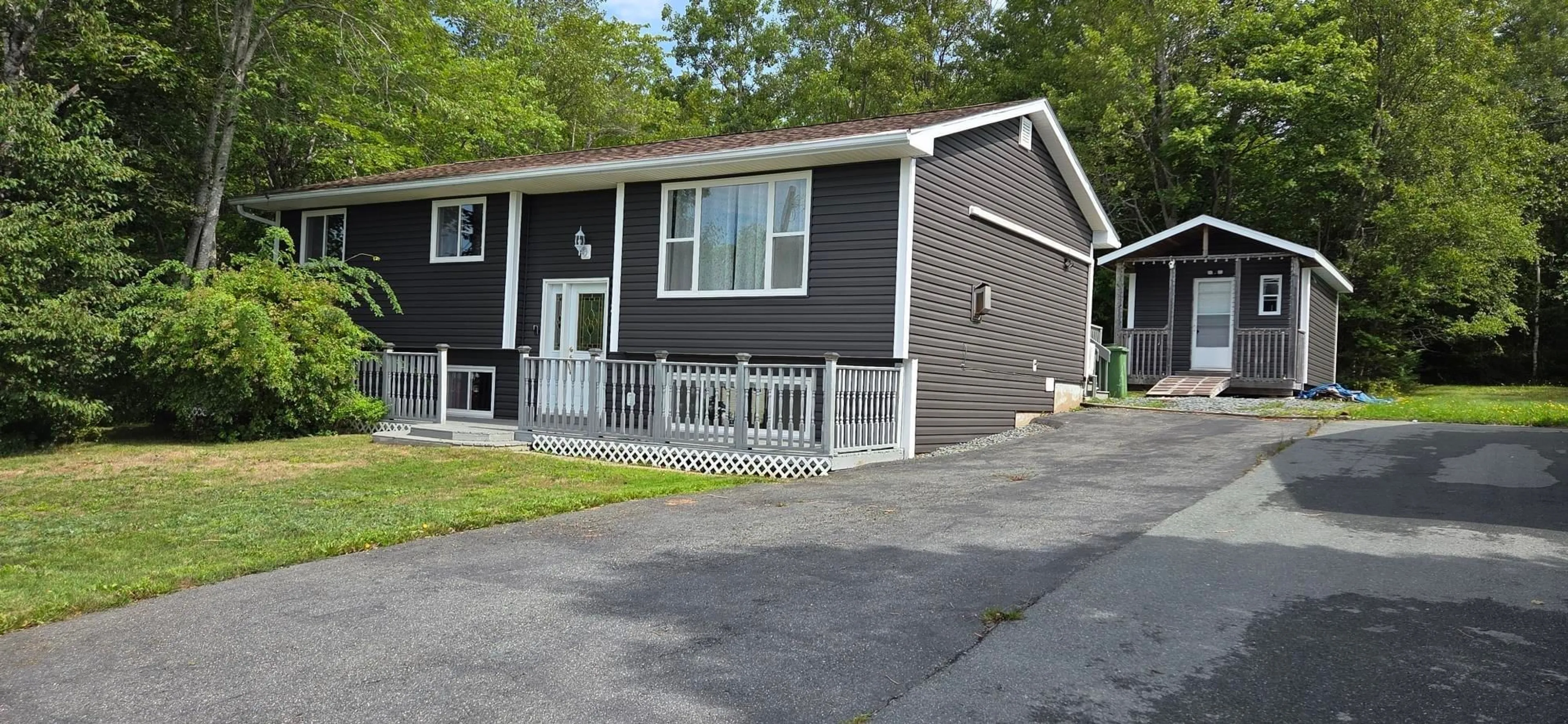 Home with vinyl exterior material, street for 25 Saturn Dr, Lower Sackville Nova Scotia B4C 2V6