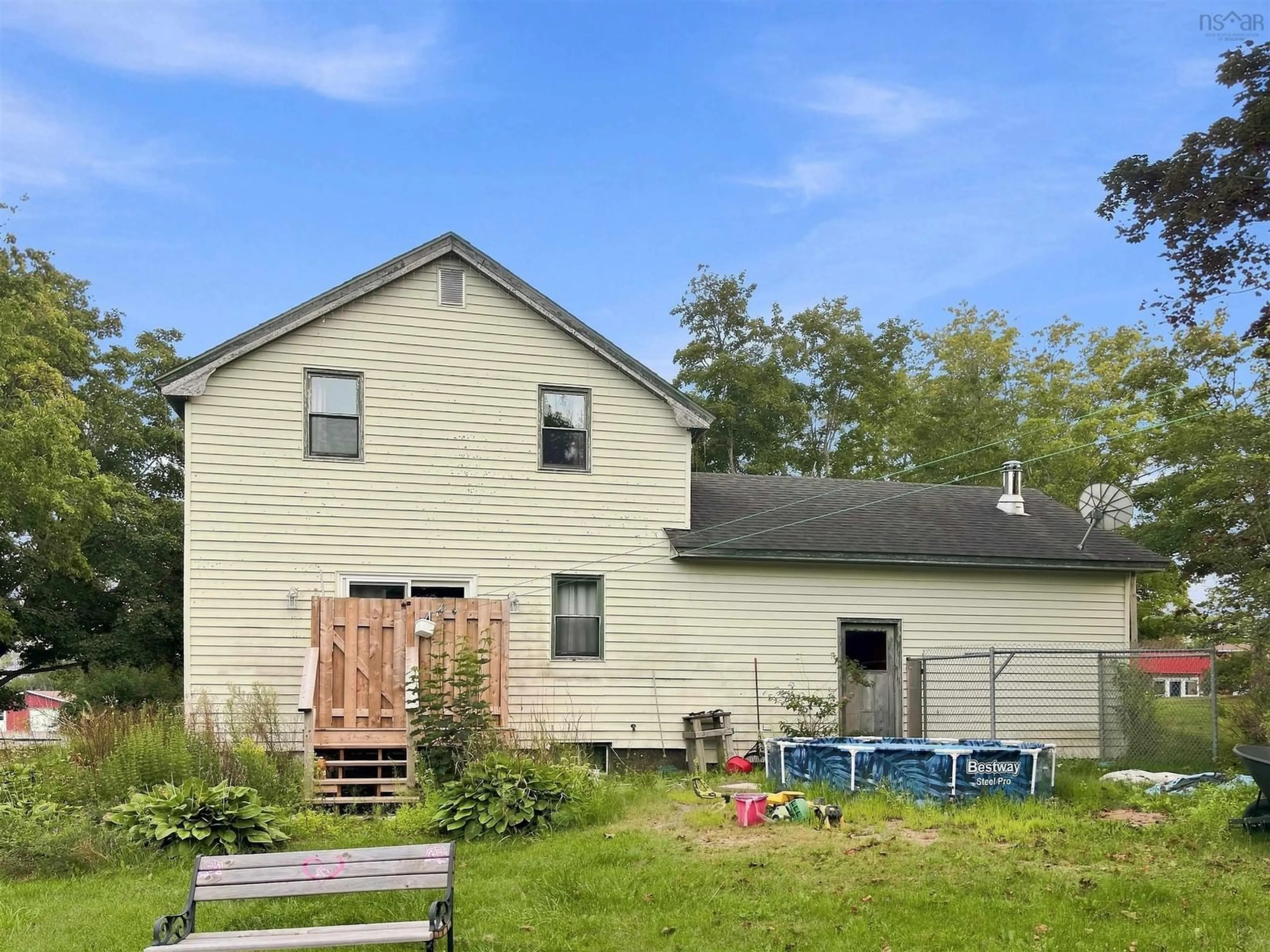 A pic from outside/outdoor area/front of a property/back of a property/a pic from drone, building for 61 Jenks Ave, Parrsboro Nova Scotia B0M 1S0