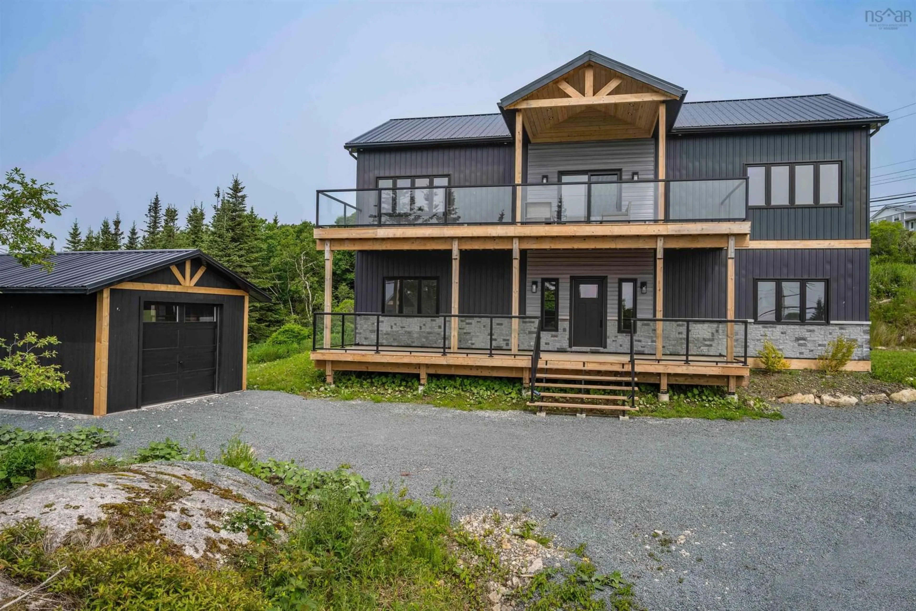 A pic from outside/outdoor area/front of a property/back of a property/a pic from drone, unknown for 1605 Terence Bay Rd, Terence Bay Nova Scotia B3T 1X9
