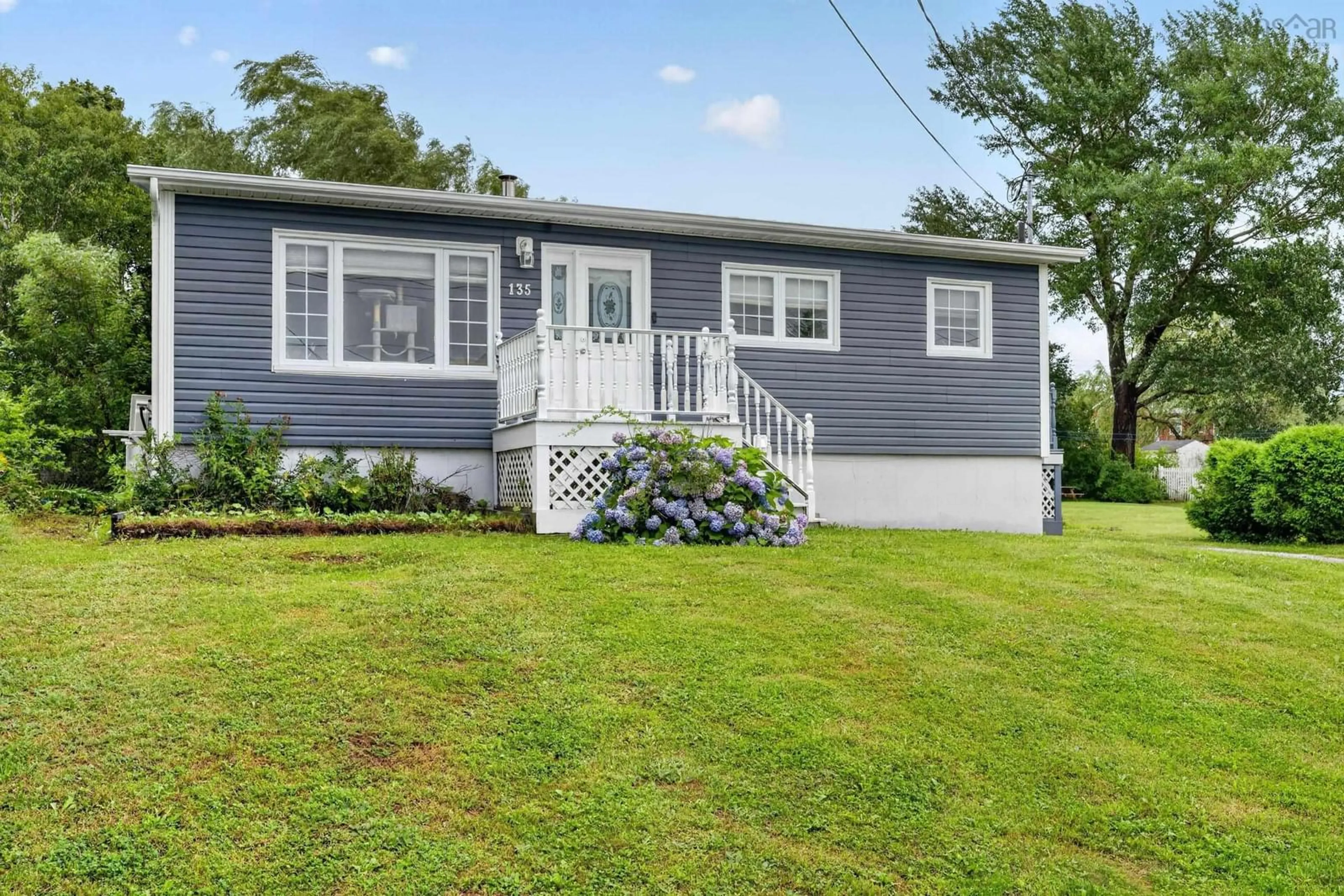 Home with vinyl exterior material, street for 135 Forrest Street, Sydney Mines Nova Scotia B1V 2B6