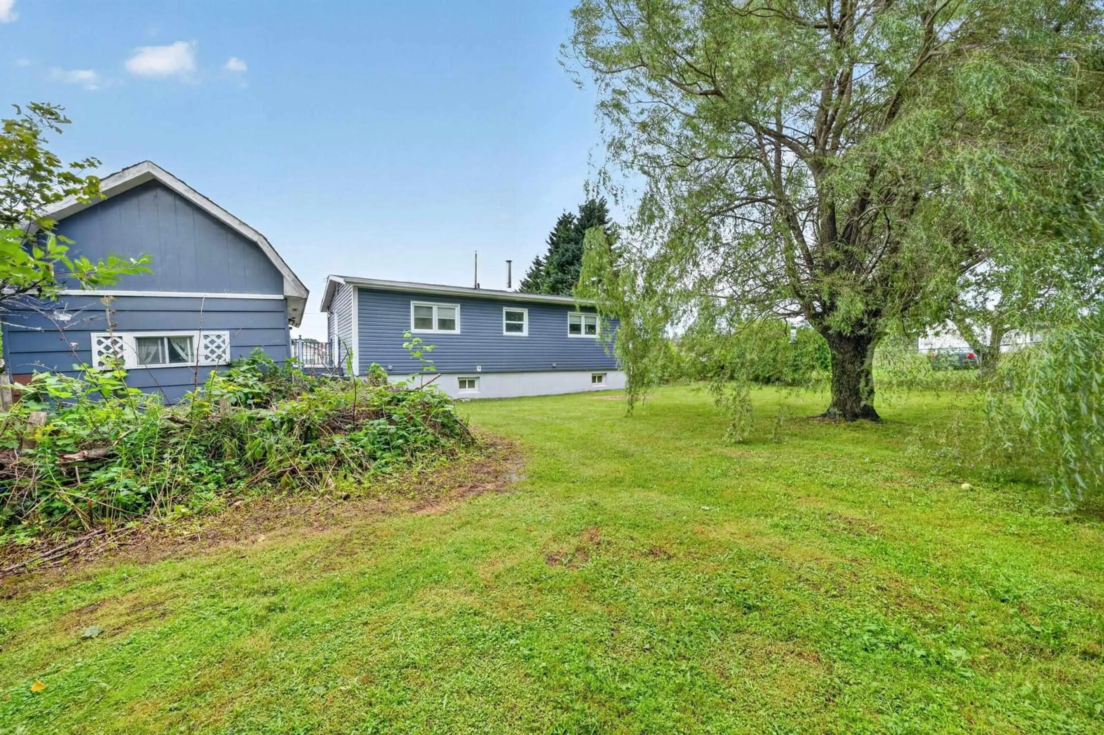 A pic from outside/outdoor area/front of a property/back of a property/a pic from drone, unknown for 135 Forrest Street, Sydney Mines Nova Scotia B1V 2B6