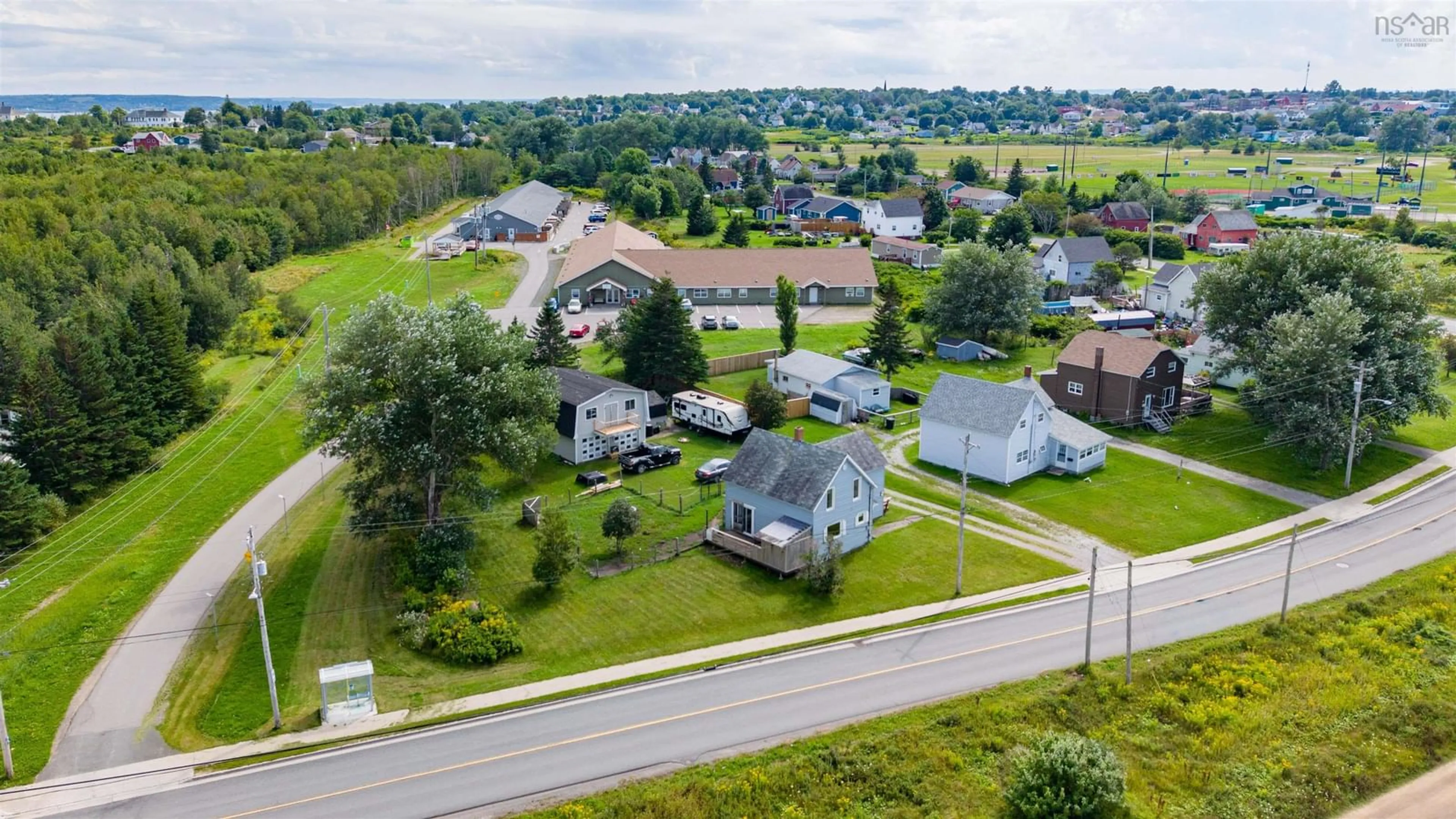 A pic from outside/outdoor area/front of a property/back of a property/a pic from drone, unknown for 218 Pitt St, Sydney Mines Nova Scotia B1V 1S3