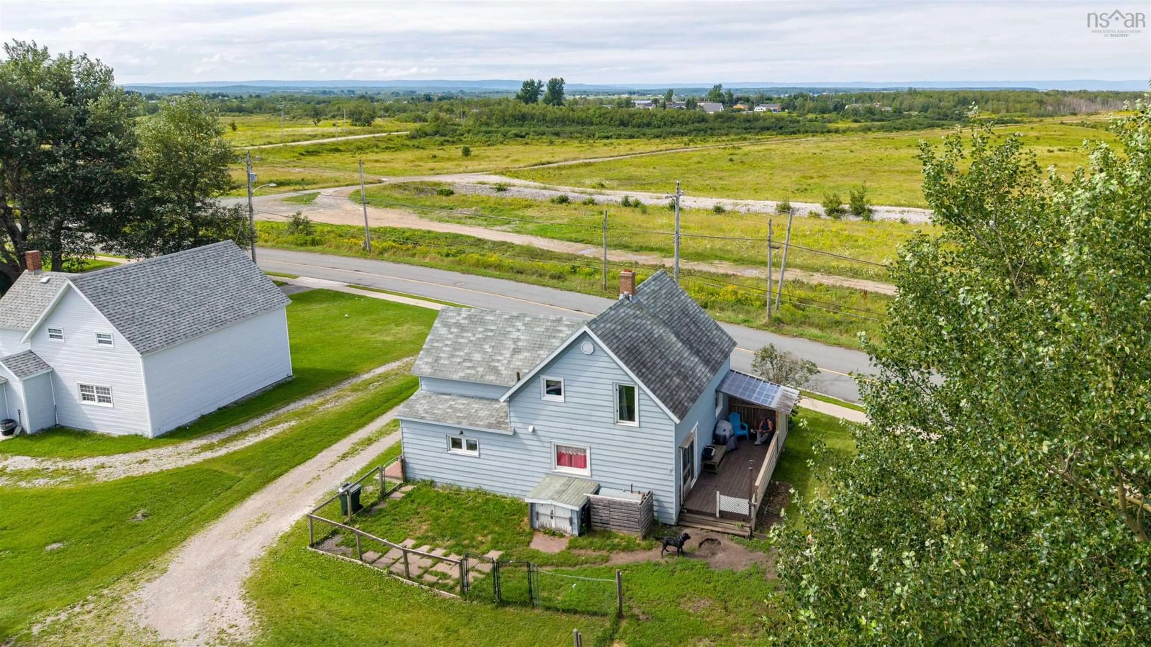 A pic from outside/outdoor area/front of a property/back of a property/a pic from drone, unknown for 218 Pitt St, Sydney Mines Nova Scotia B1V 1S3