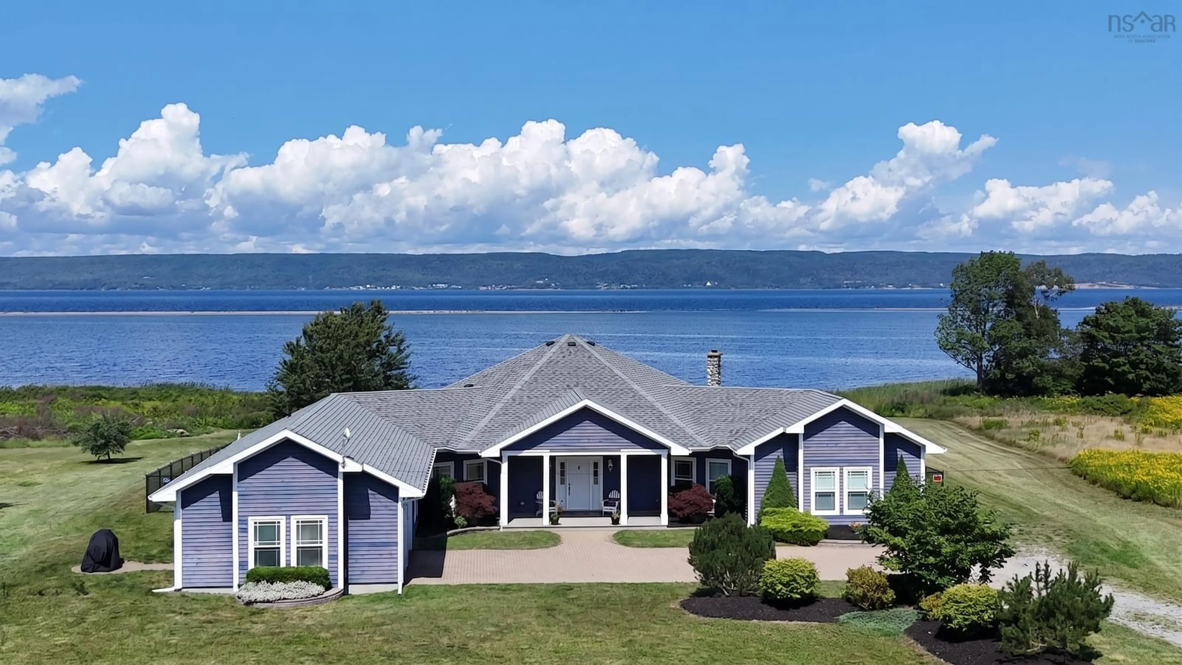 Home with vinyl exterior material, water/lake/river/ocean view for 7914 East Bay Hwy, Big Pond Centre Nova Scotia B1J 1Z5