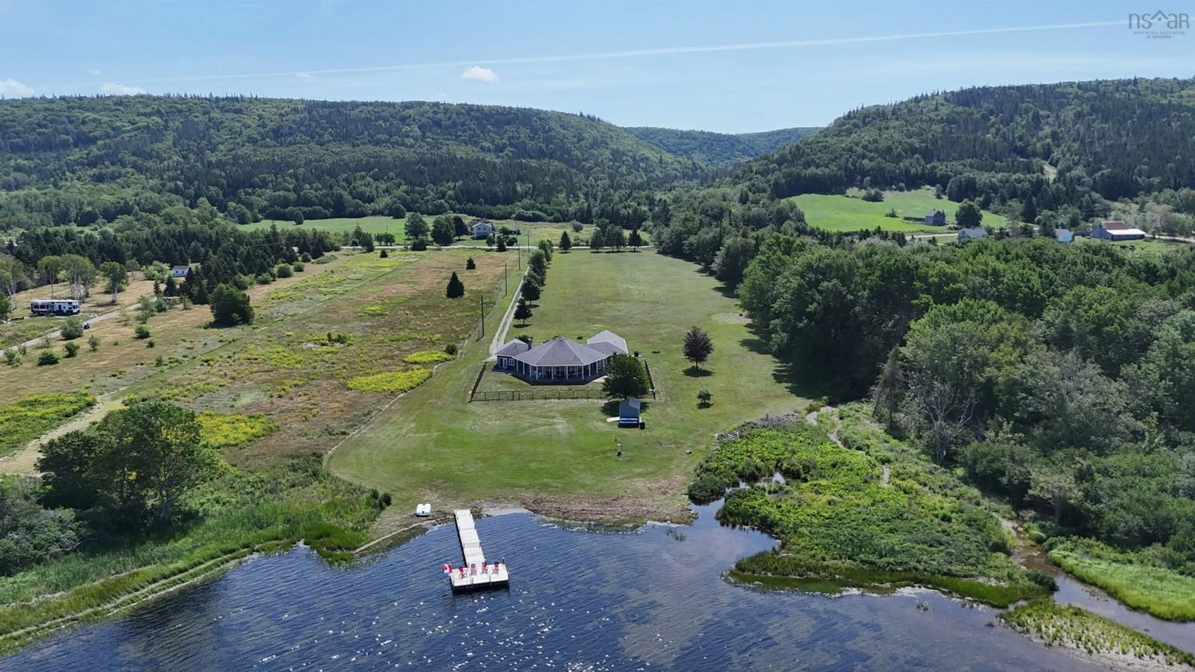A pic from outside/outdoor area/front of a property/back of a property/a pic from drone, water/lake/river/ocean view for 7914 East Bay Hwy, Big Pond Centre Nova Scotia B1J 1Z5