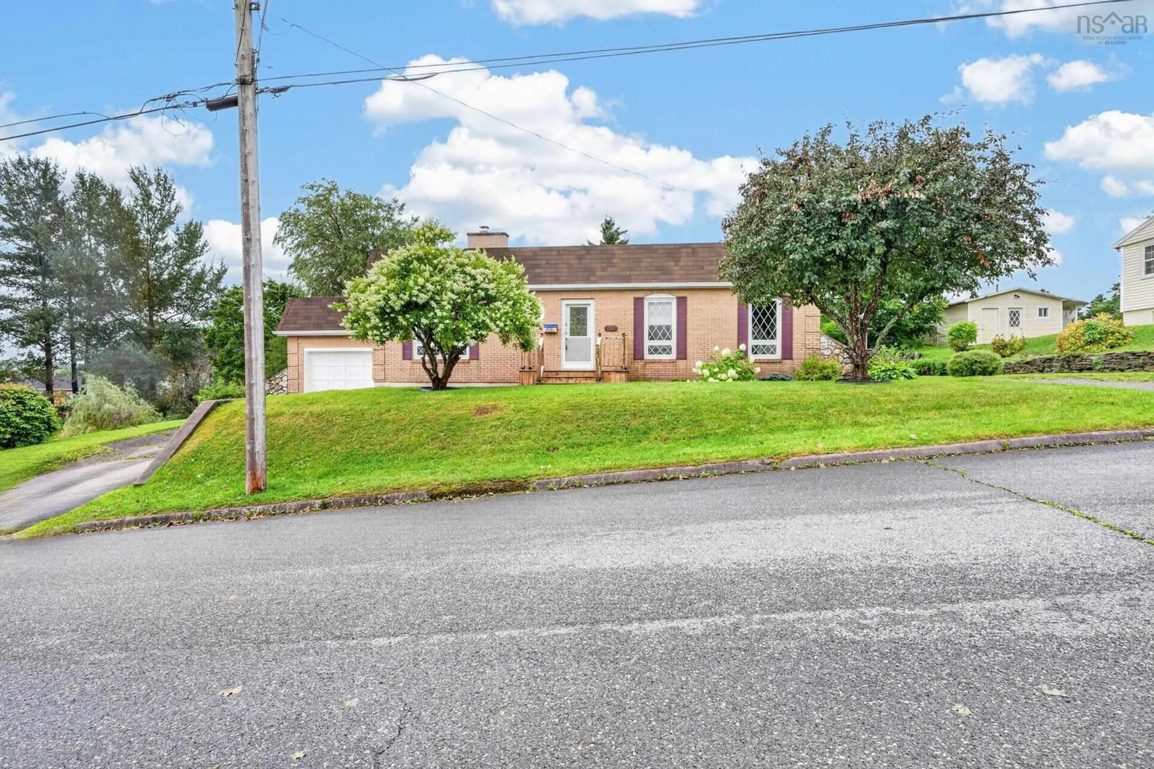 A pic from outside/outdoor area/front of a property/back of a property/a pic from drone, street for 38 Leeside Drive, Coxheath Nova Scotia B1R 1S6