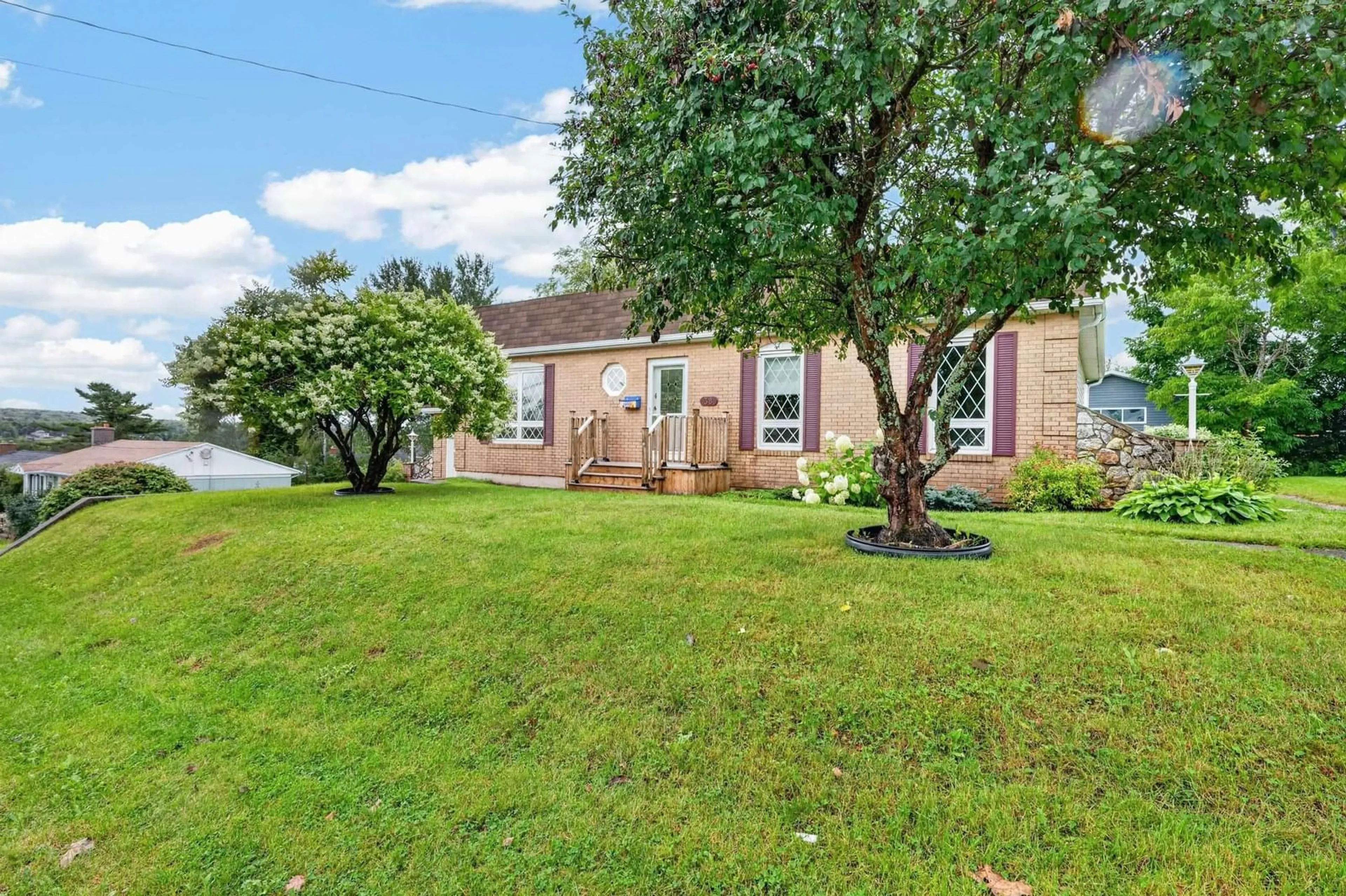 A pic from outside/outdoor area/front of a property/back of a property/a pic from drone, street for 38 Leeside Drive, Coxheath Nova Scotia B1R 1S6