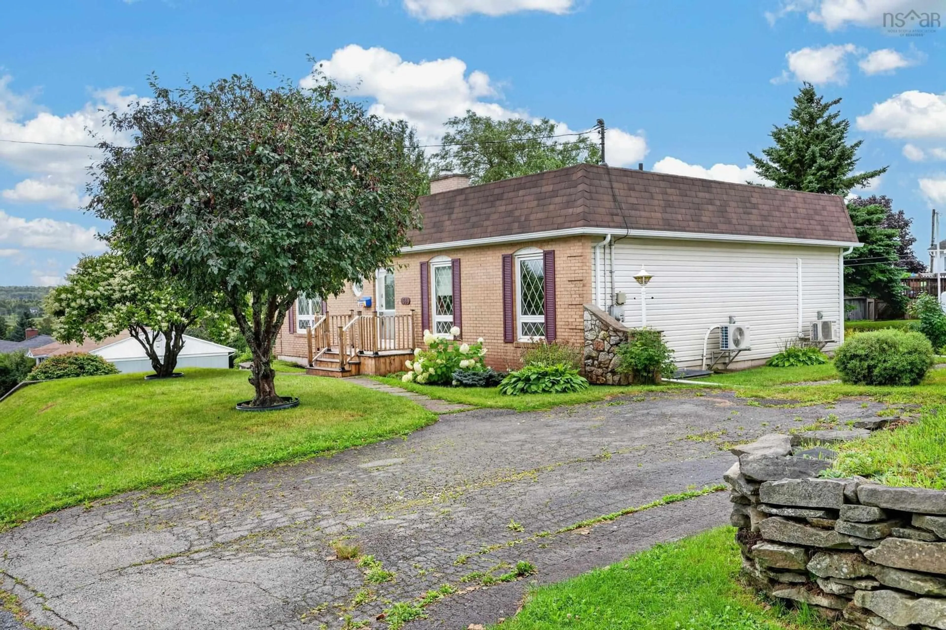 A pic from outside/outdoor area/front of a property/back of a property/a pic from drone, street for 38 Leeside Drive, Coxheath Nova Scotia B1R 1S6