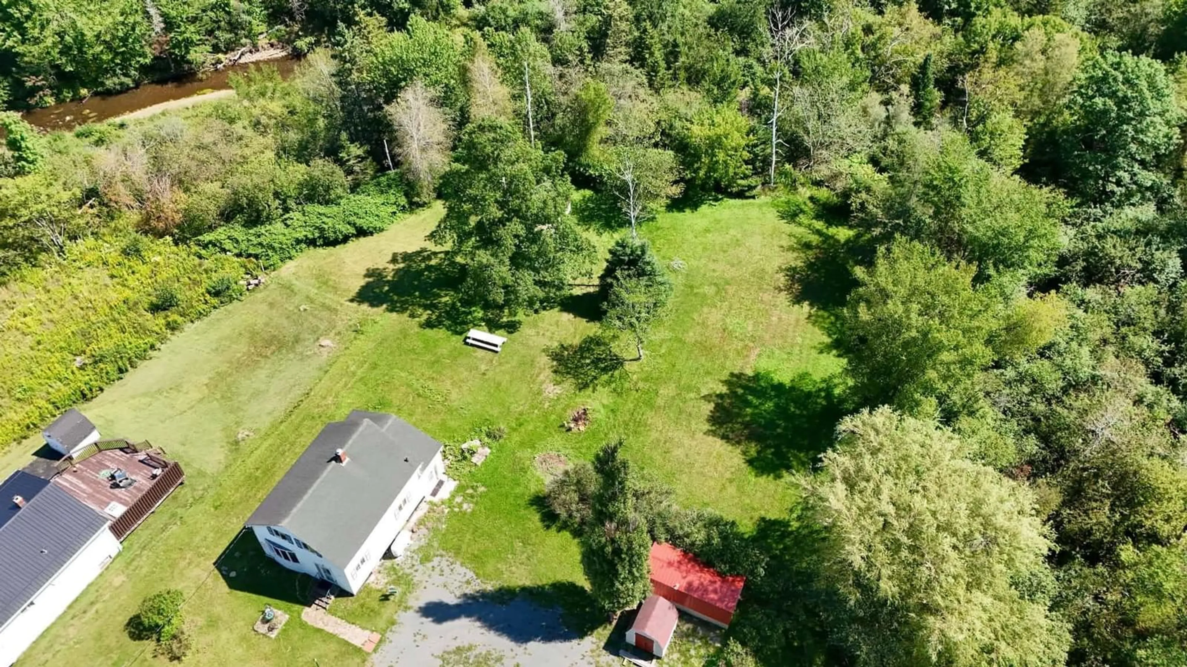 A pic from outside/outdoor area/front of a property/back of a property/a pic from drone, forest/trees view for 189 James St, Truro Nova Scotia B2N 2Z9