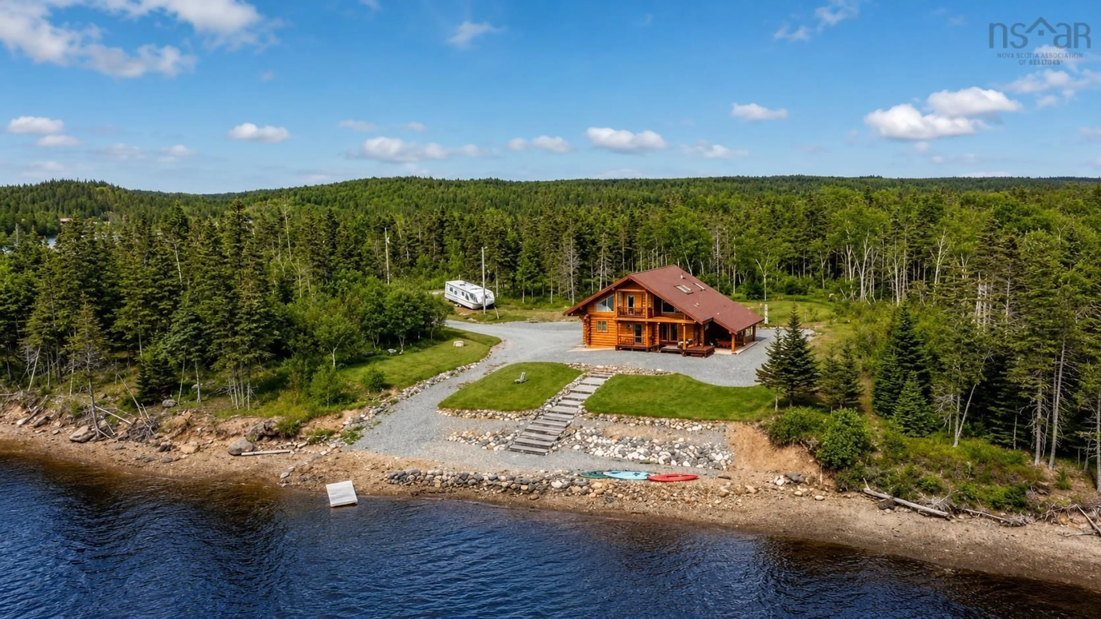 A pic from outside/outdoor area/front of a property/back of a property/a pic from drone, water/lake/river/ocean view for 325 South Head Rd, South Head Nova Scotia B1B 0A1