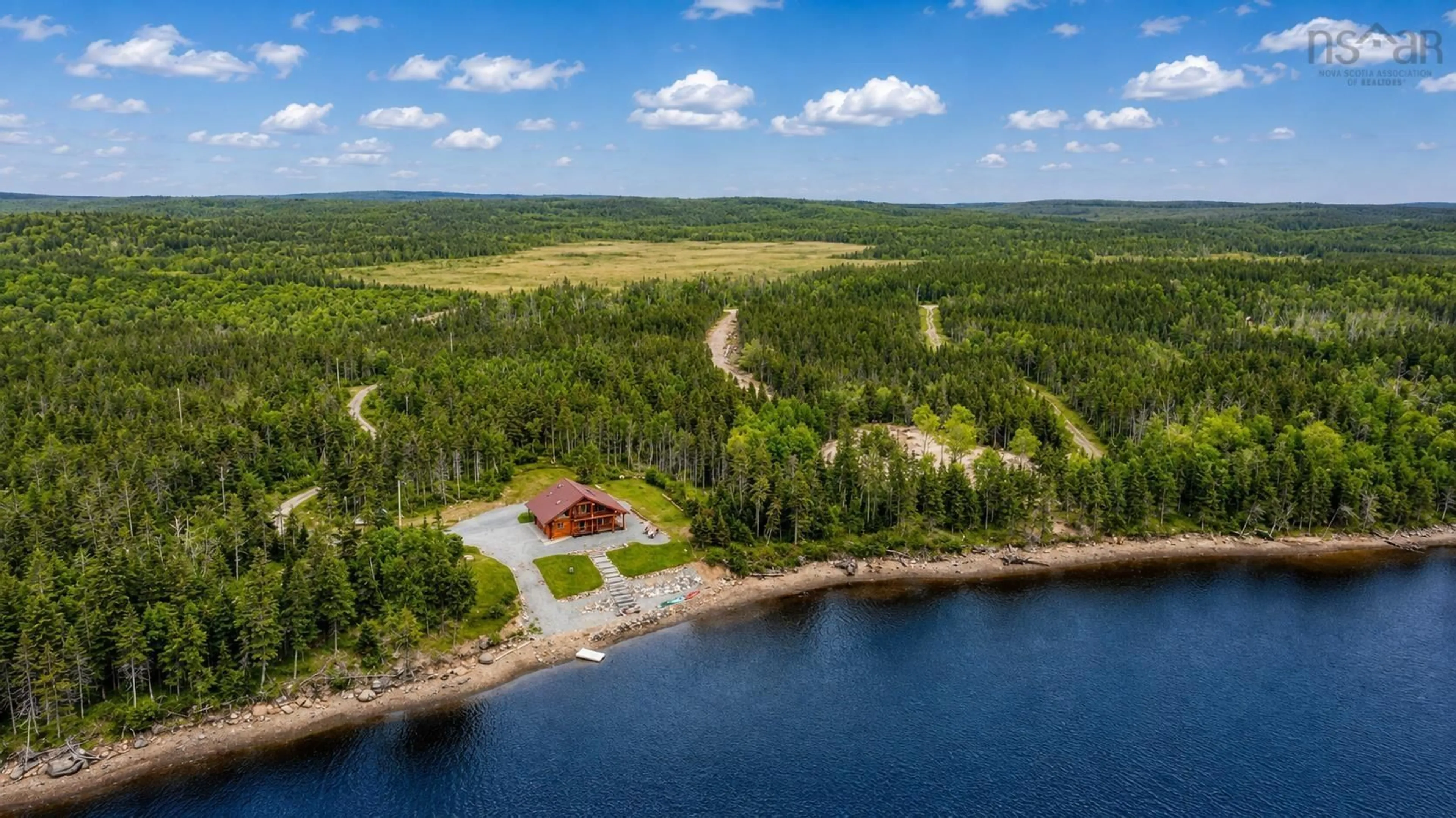 A pic from outside/outdoor area/front of a property/back of a property/a pic from drone, water/lake/river/ocean view for 325 South Head Rd, South Head Nova Scotia B1B 0A1