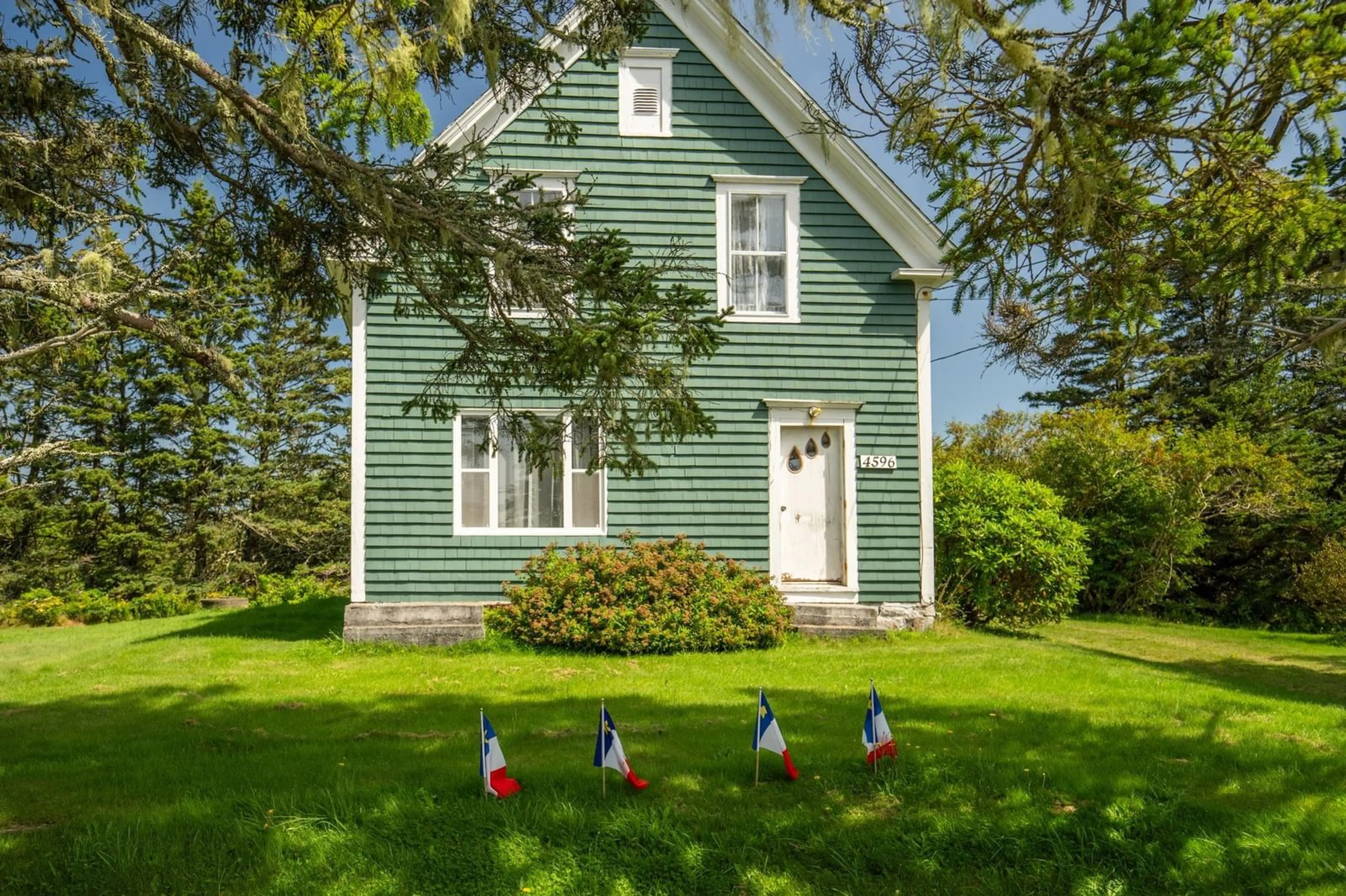 Home with vinyl exterior material, street for 4596 Highway 1, Woodvale Nova Scotia B0W 3T0