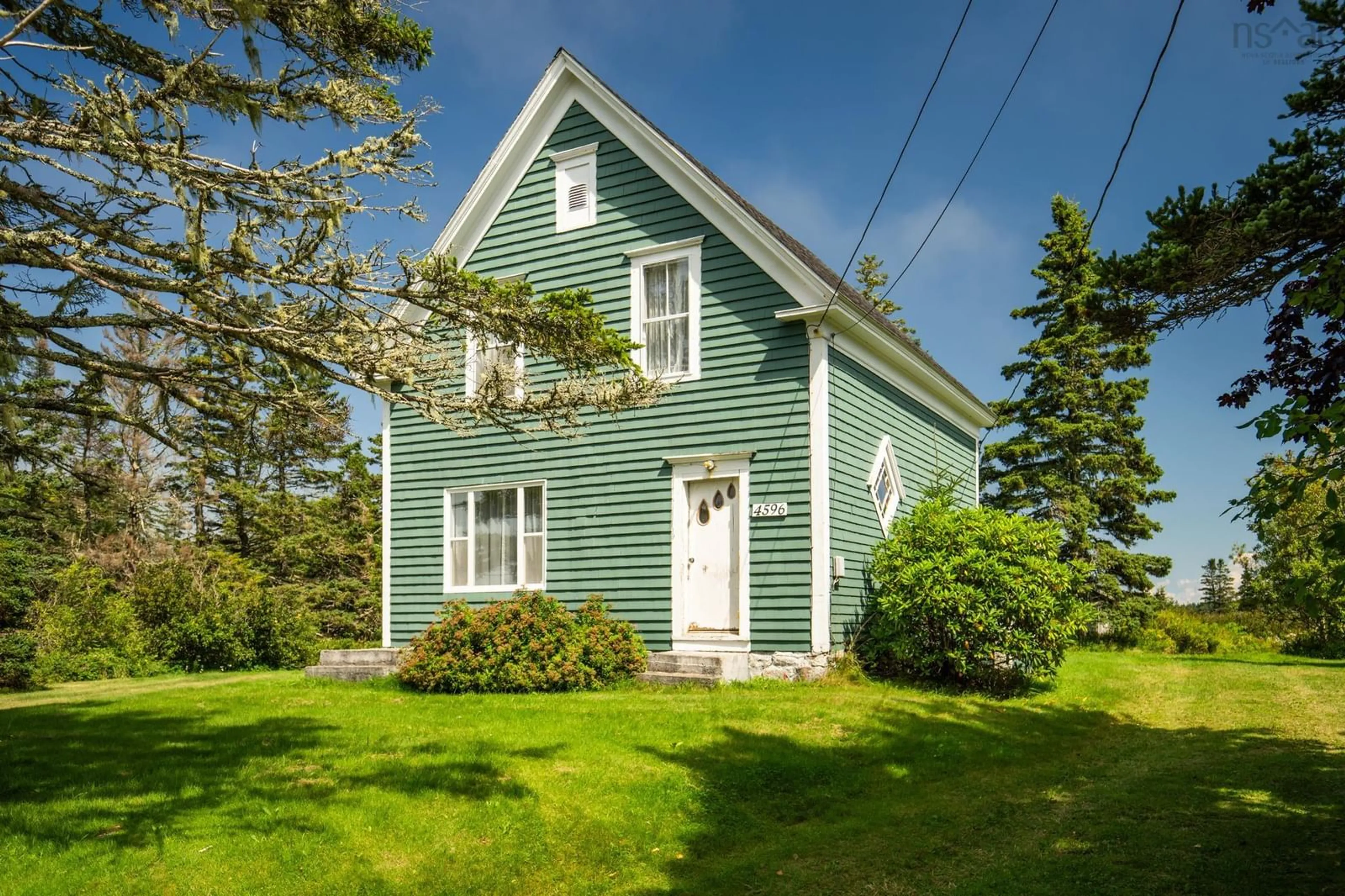 Home with vinyl exterior material, street for 4596 Highway 1, Woodvale Nova Scotia B0W 3T0