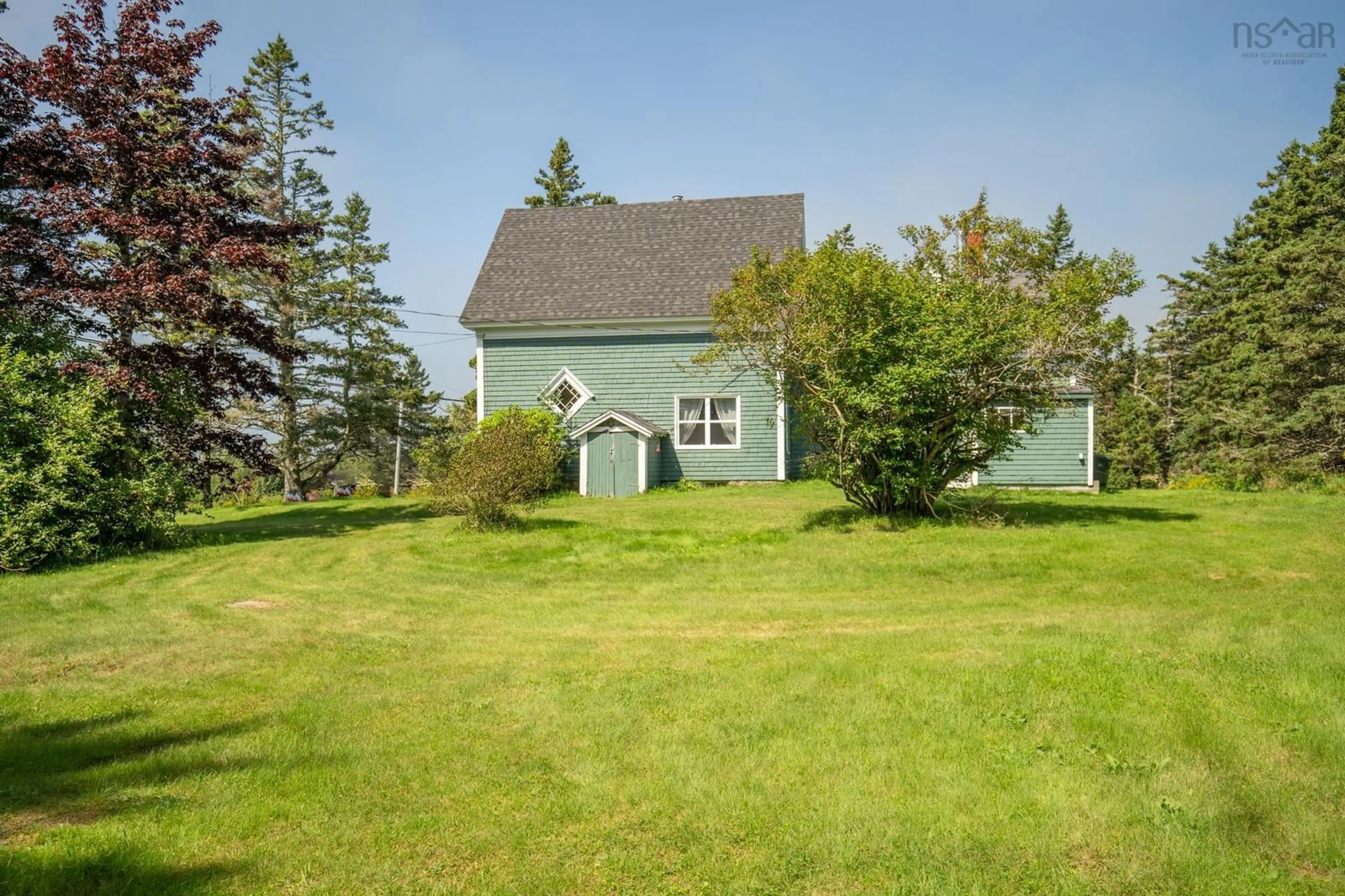 A pic from outside/outdoor area/front of a property/back of a property/a pic from drone, unknown for 4596 Highway 1, Woodvale Nova Scotia B0W 3T0