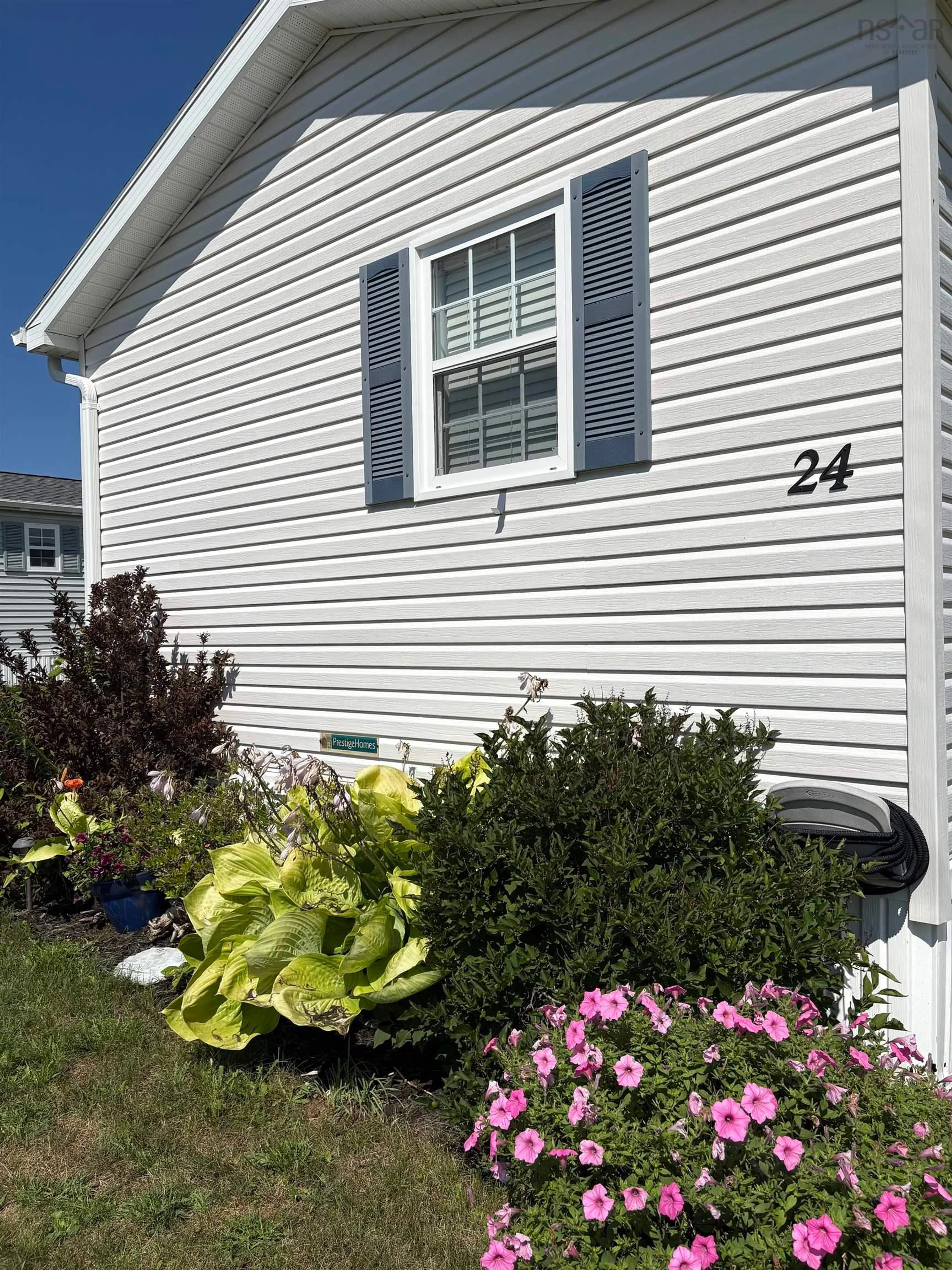 Home with vinyl exterior material, street for 24 South Hill Drive, West River Nova Scotia B2G 2V9