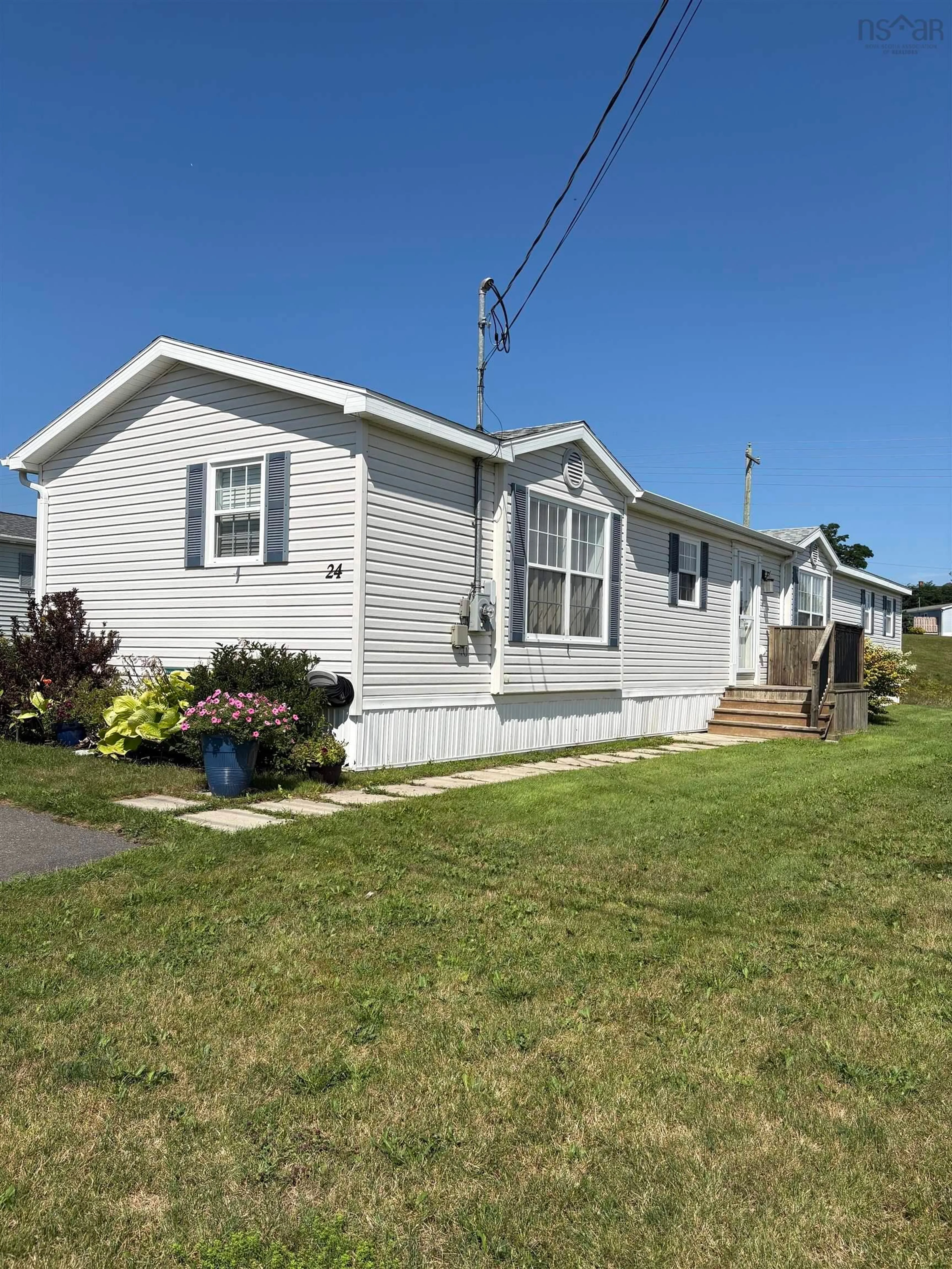 Home with vinyl exterior material, street for 24 South Hill Drive, West River Nova Scotia B2G 2V9