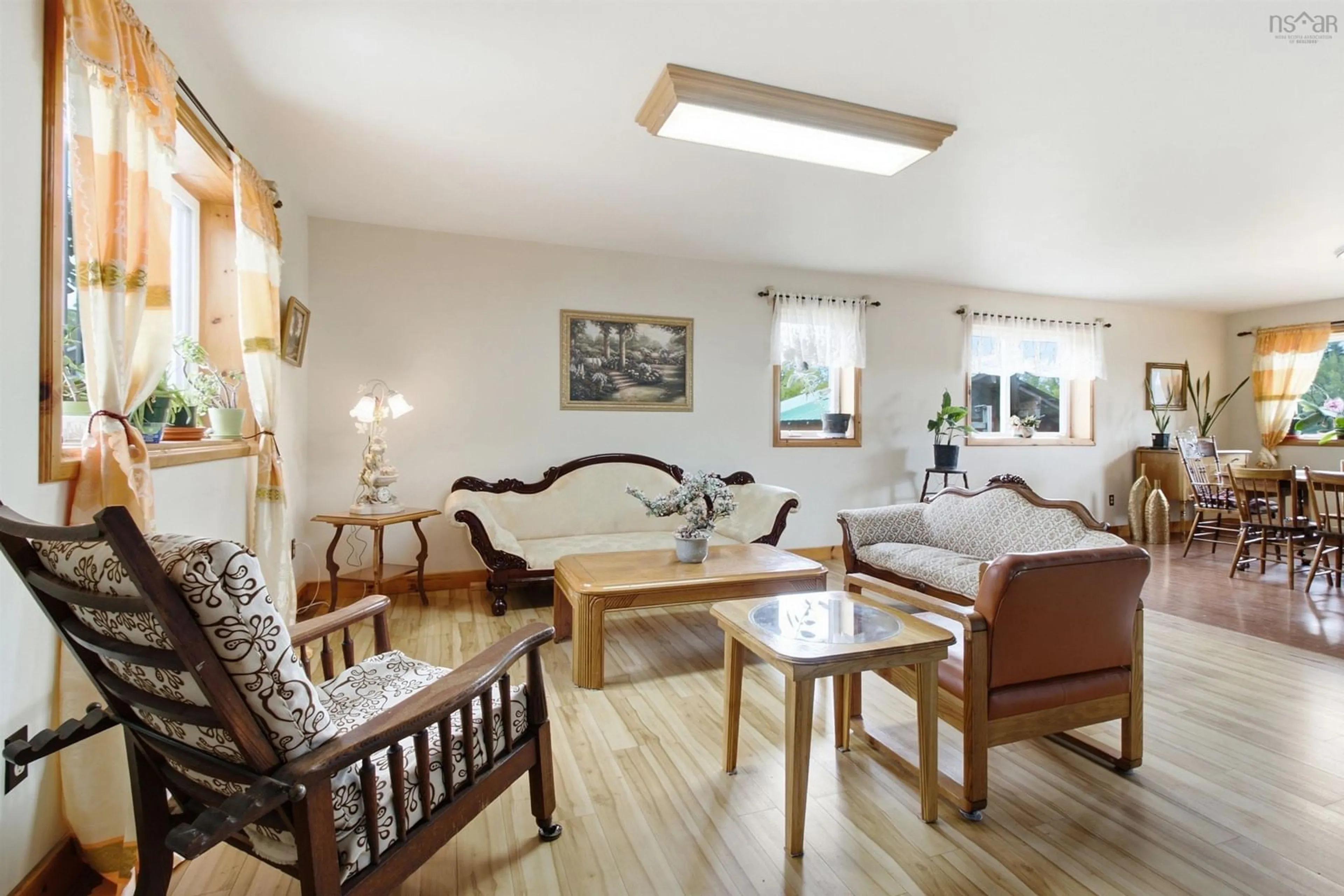 Living room with furniture, wood/laminate floor for 2804 New Russell Rd, New Russell Nova Scotia B0J 2M0