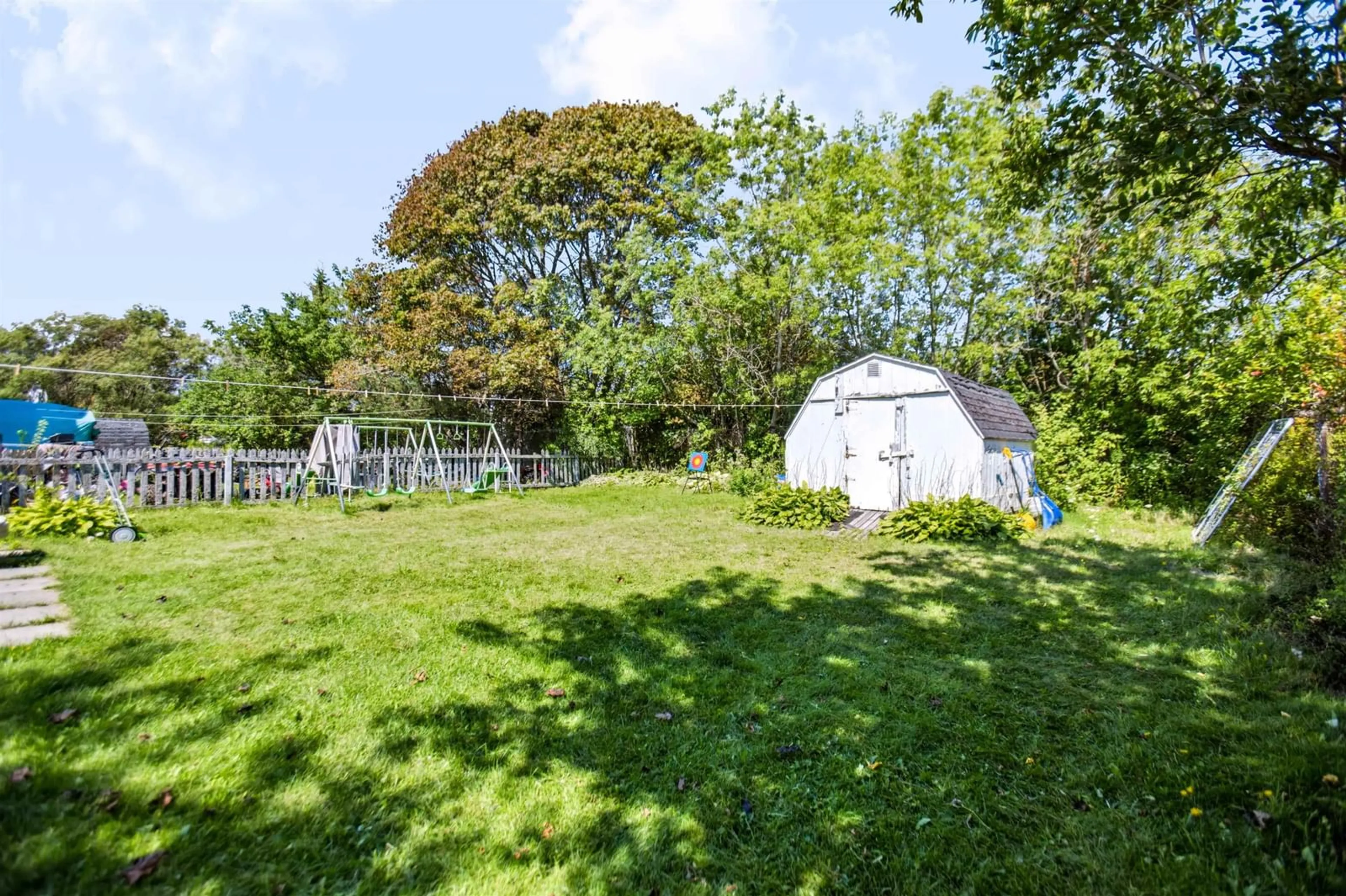 A pic from outside/outdoor area/front of a property/back of a property/a pic from drone, forest/trees view for 8 Lusby St, Amherst Nova Scotia B4H 2S3