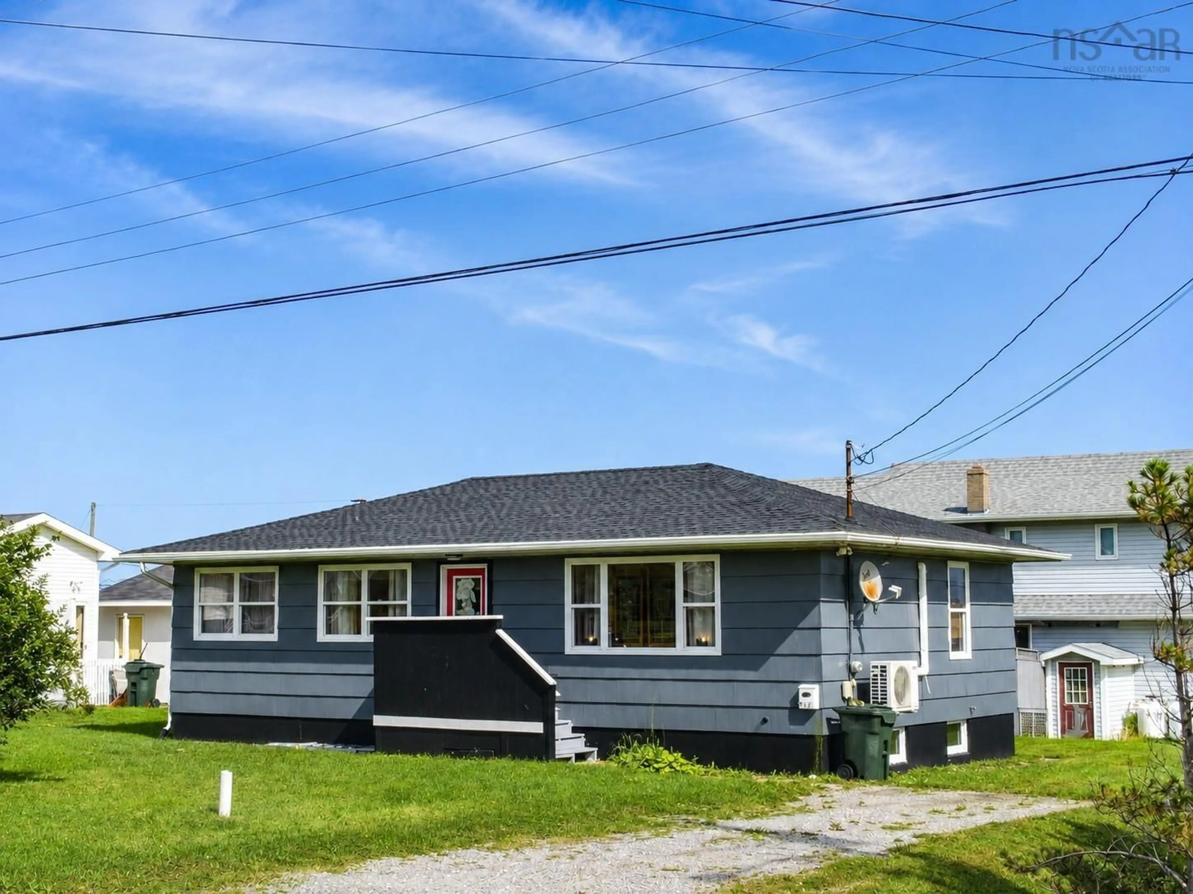 Home with vinyl exterior material, street for 218 Waterview St, New Waterford Nova Scotia B1H 3G4