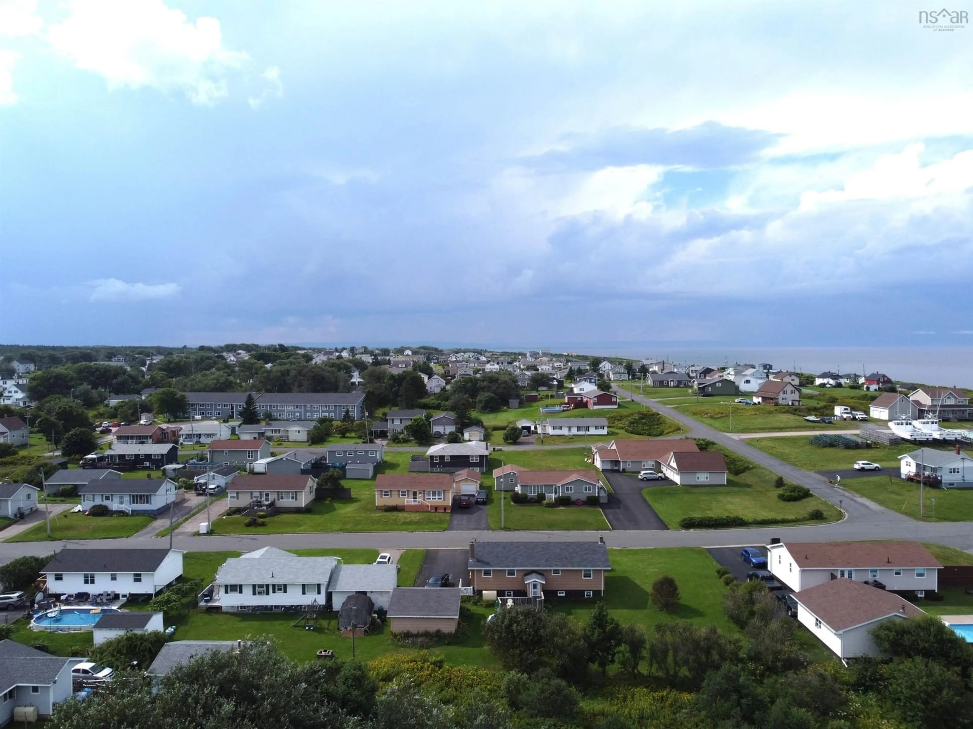 A pic from outside/outdoor area/front of a property/back of a property/a pic from drone, unknown for 218 Waterview St, New Waterford Nova Scotia B1H 3G4