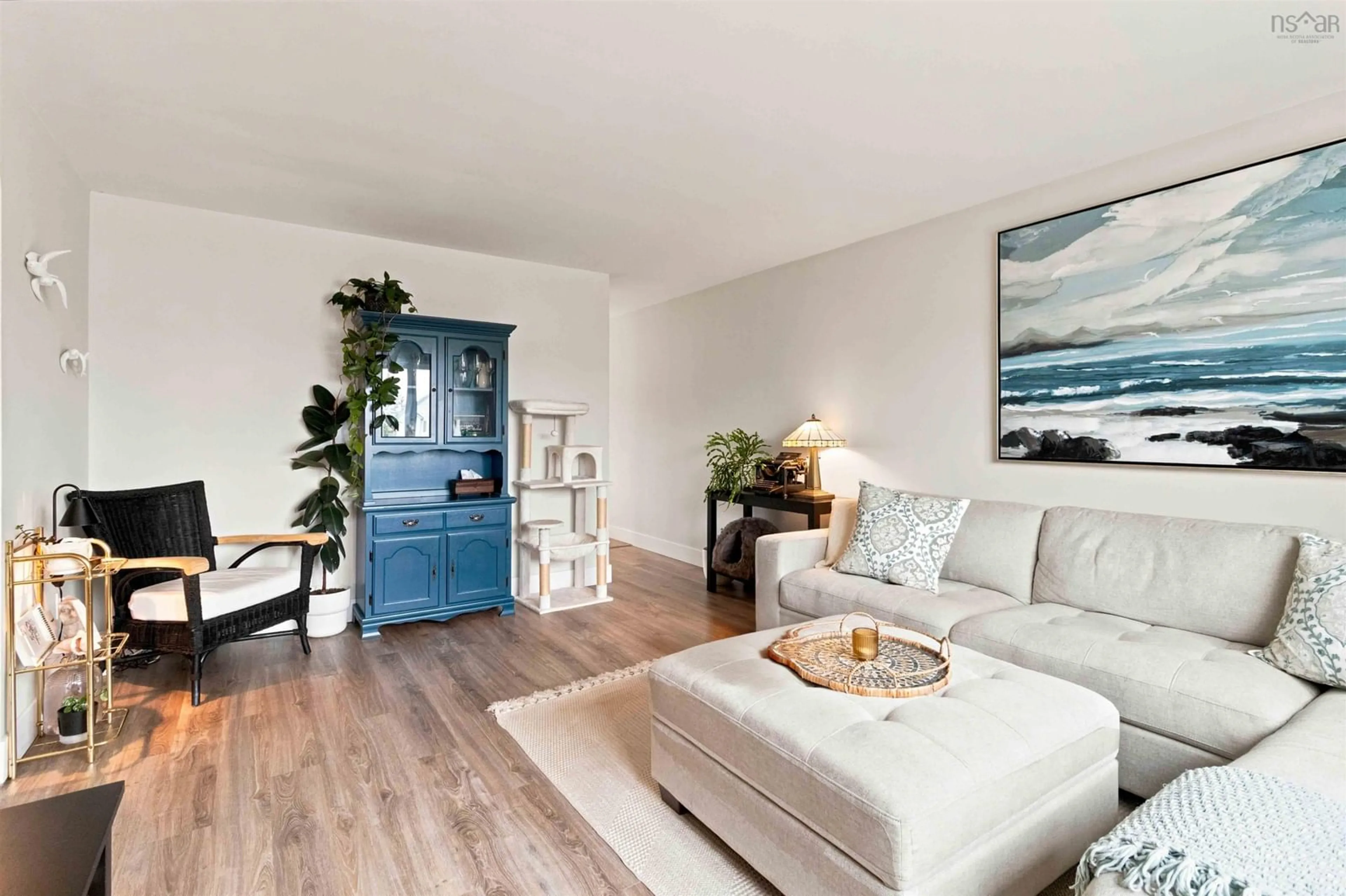 Living room with furniture, wood/laminate floor for 67 Thorncrest Crt, Eastern Passage Nova Scotia B3G 1N4