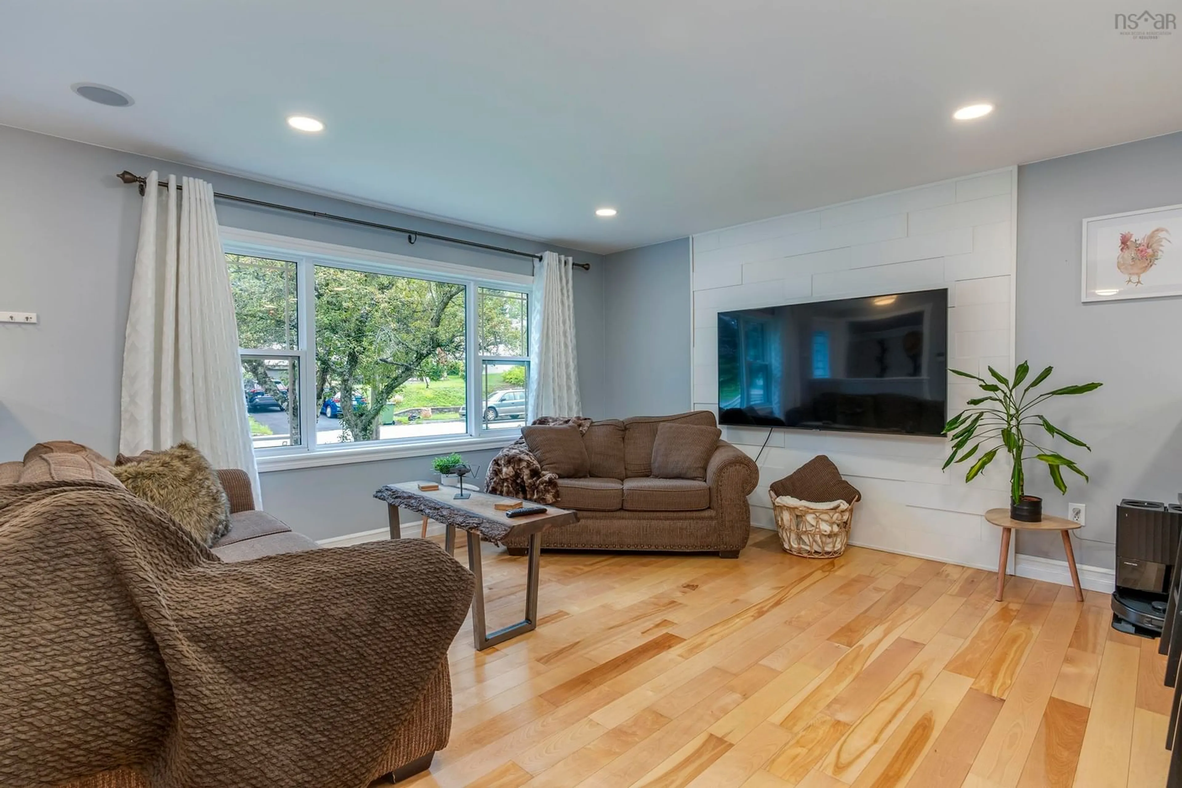 Living room with furniture, wood/laminate floor for 4 Clysdale Dr, Woodlawn Nova Scotia B2W 2P6