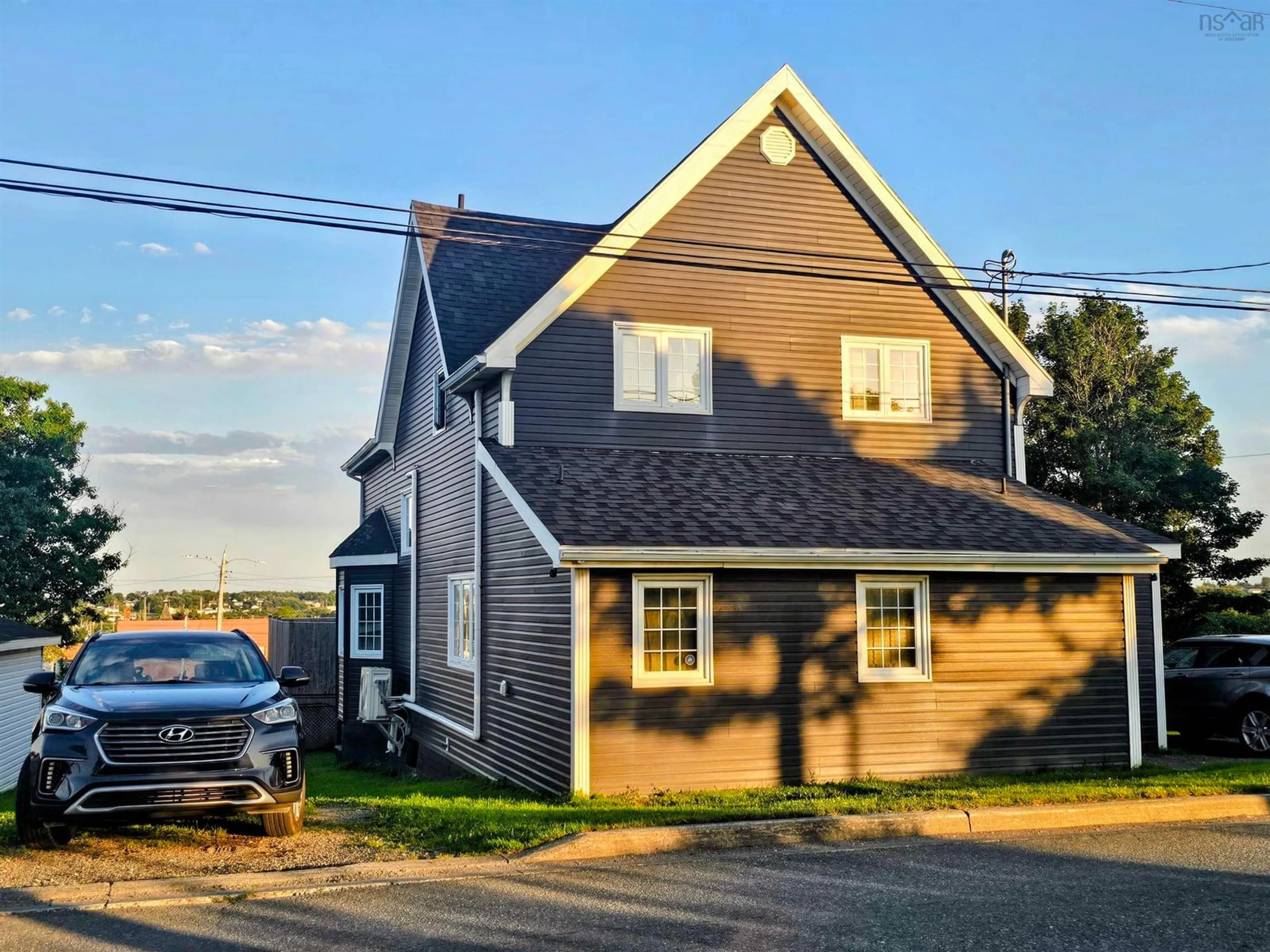 A pic from outside/outdoor area/front of a property/back of a property/a pic from drone, street for 7 Official Row, Glace Bay Nova Scotia B1A 2W6