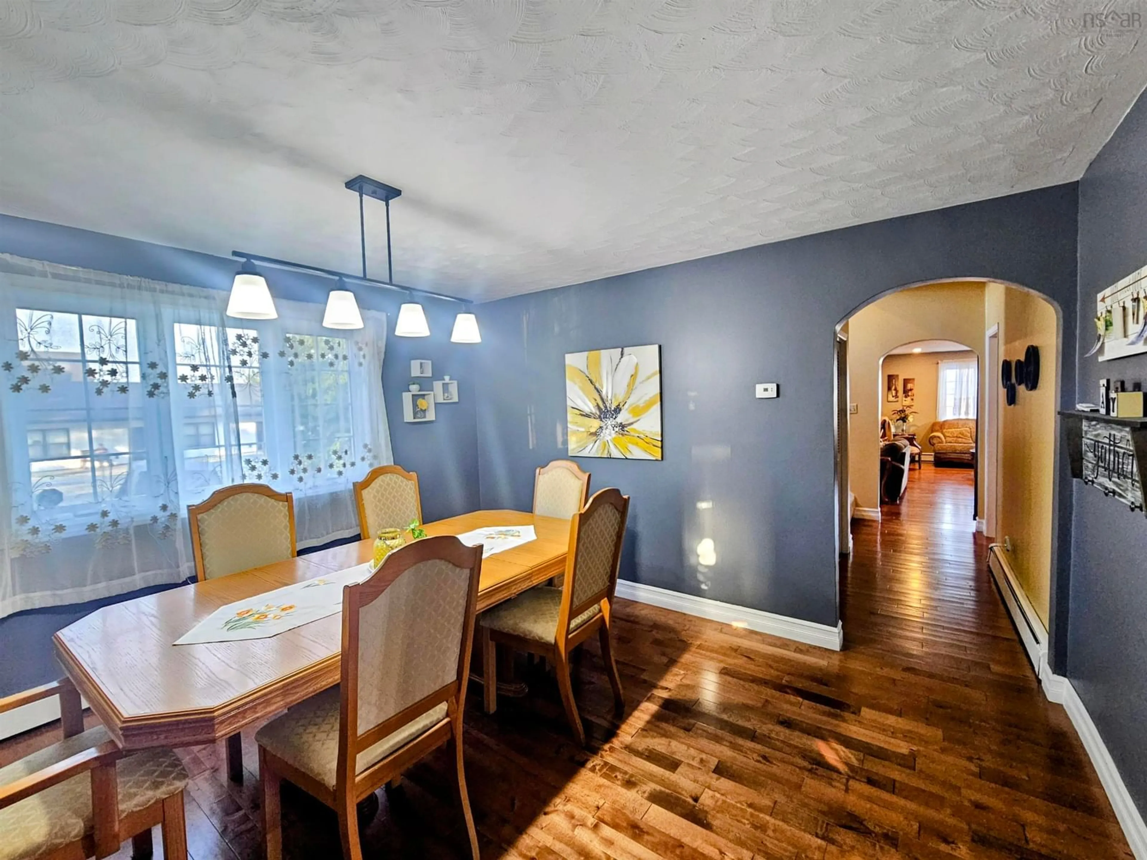 Dining room, wood/laminate floor for 7 Official Row, Glace Bay Nova Scotia B1A 2W6