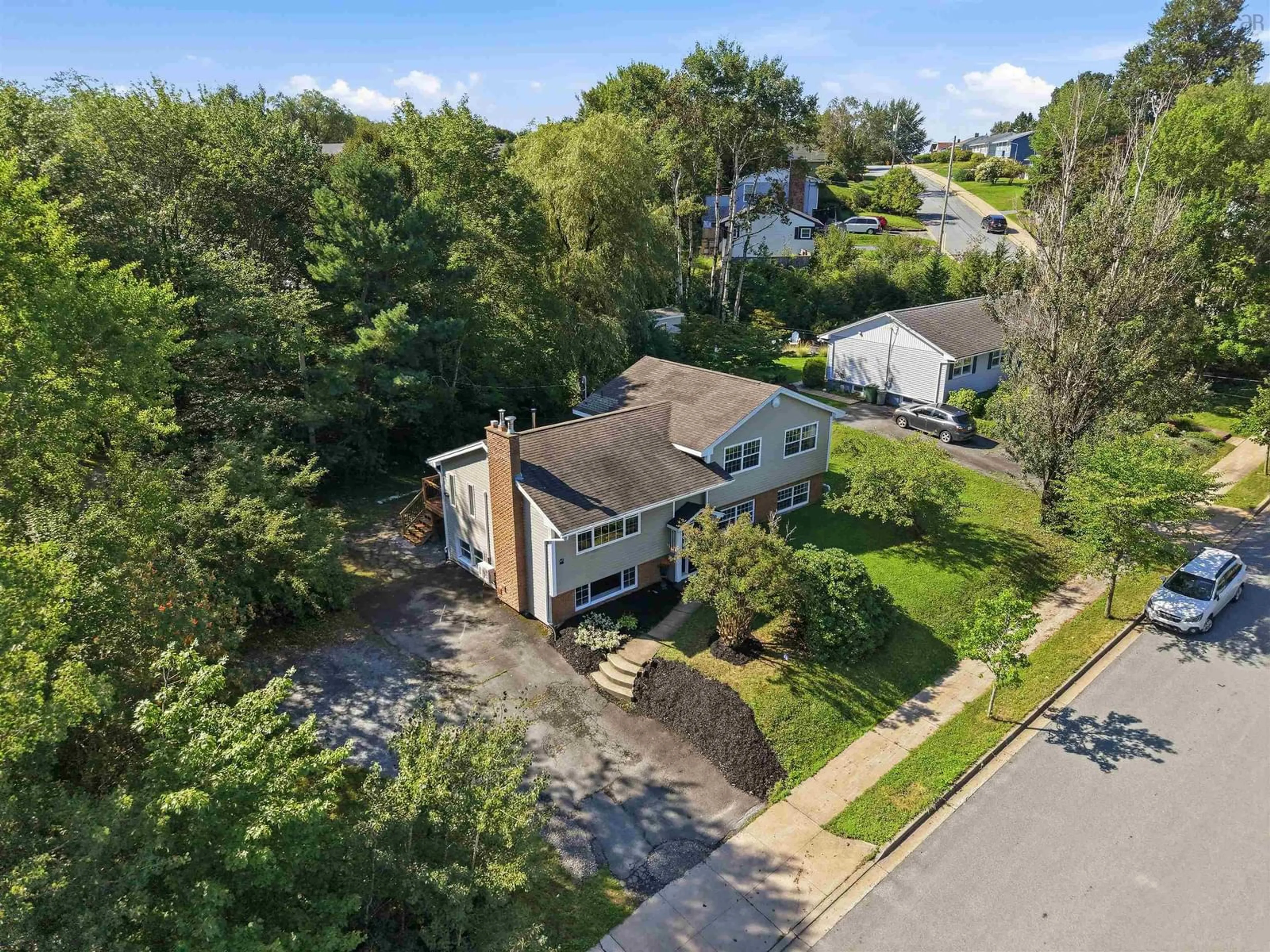 A pic from outside/outdoor area/front of a property/back of a property/a pic from drone, street for 63 Raymond Dr, Lower Sackville Nova Scotia B4C 1H5