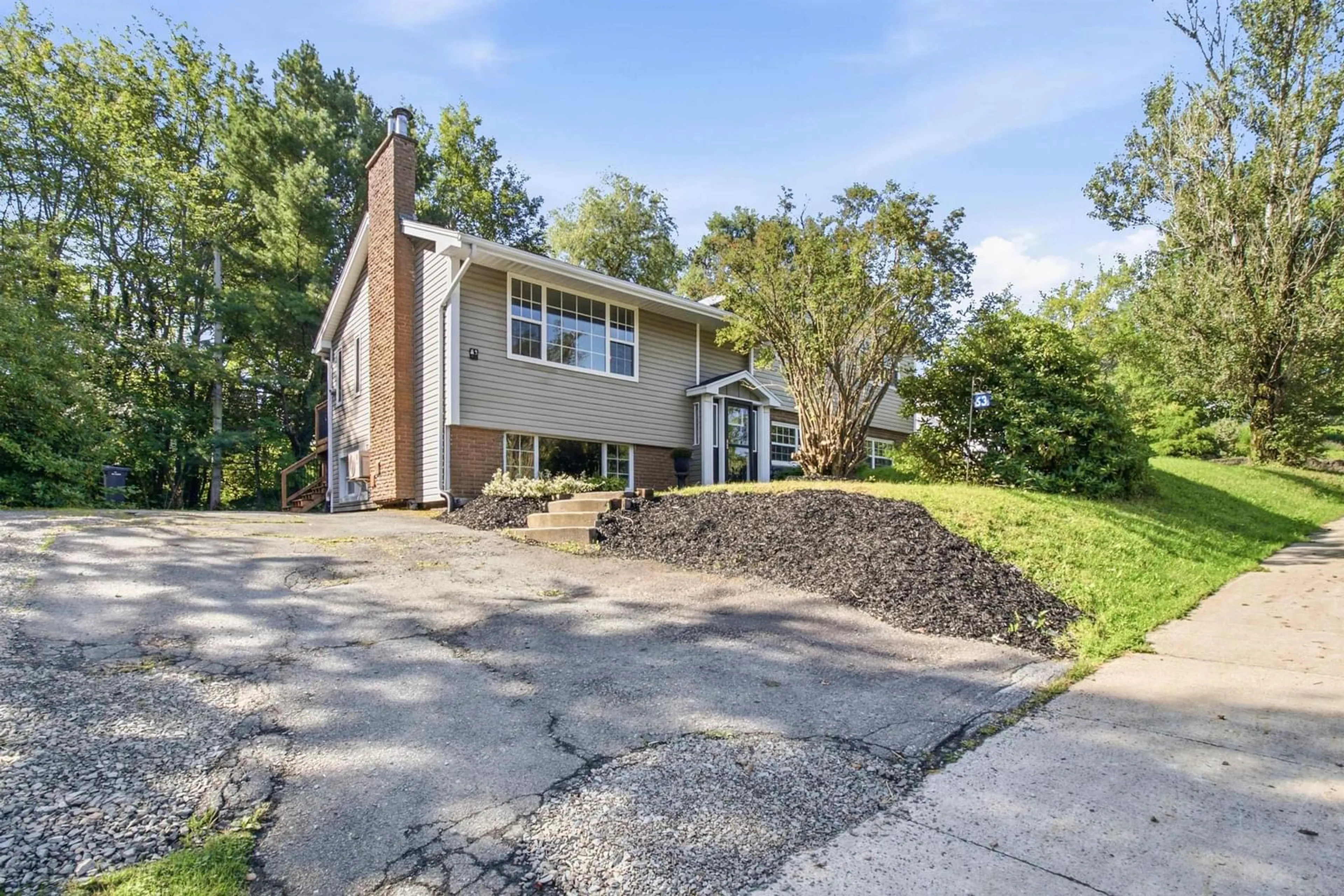 Home with brick exterior material, street for 63 Raymond Dr, Lower Sackville Nova Scotia B4C 1H5