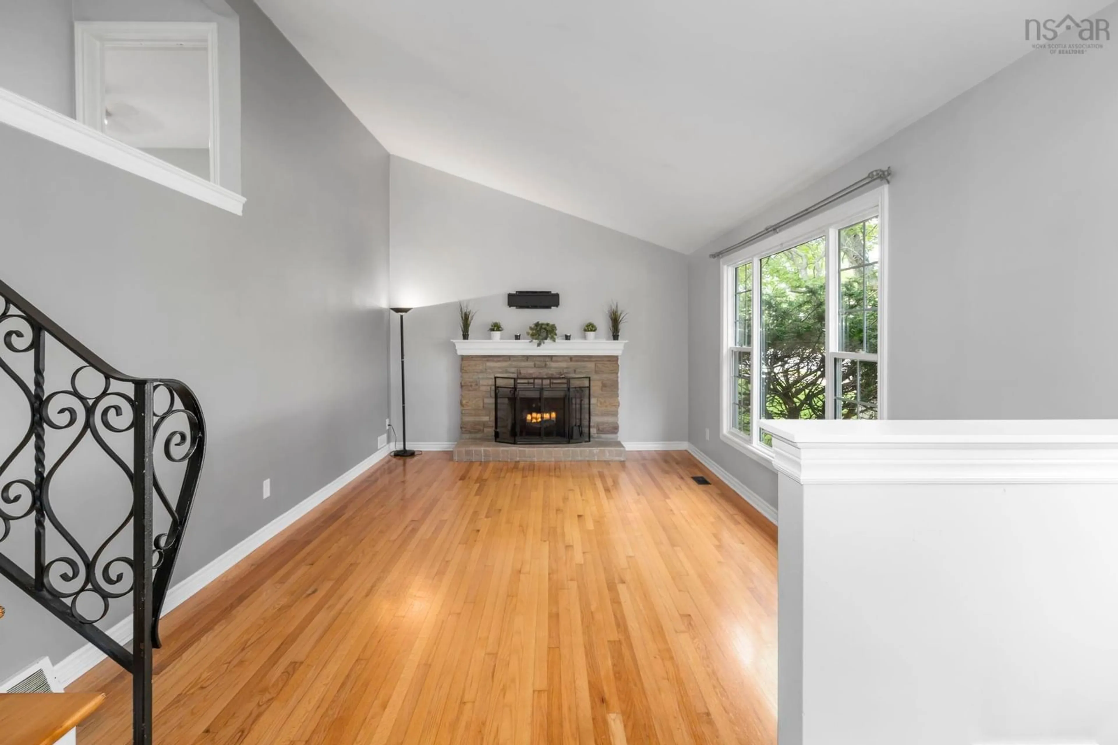 Living room with furniture, wood/laminate floor for 25 Dumbarton Ave, Dartmouth Nova Scotia B2X 1Z8