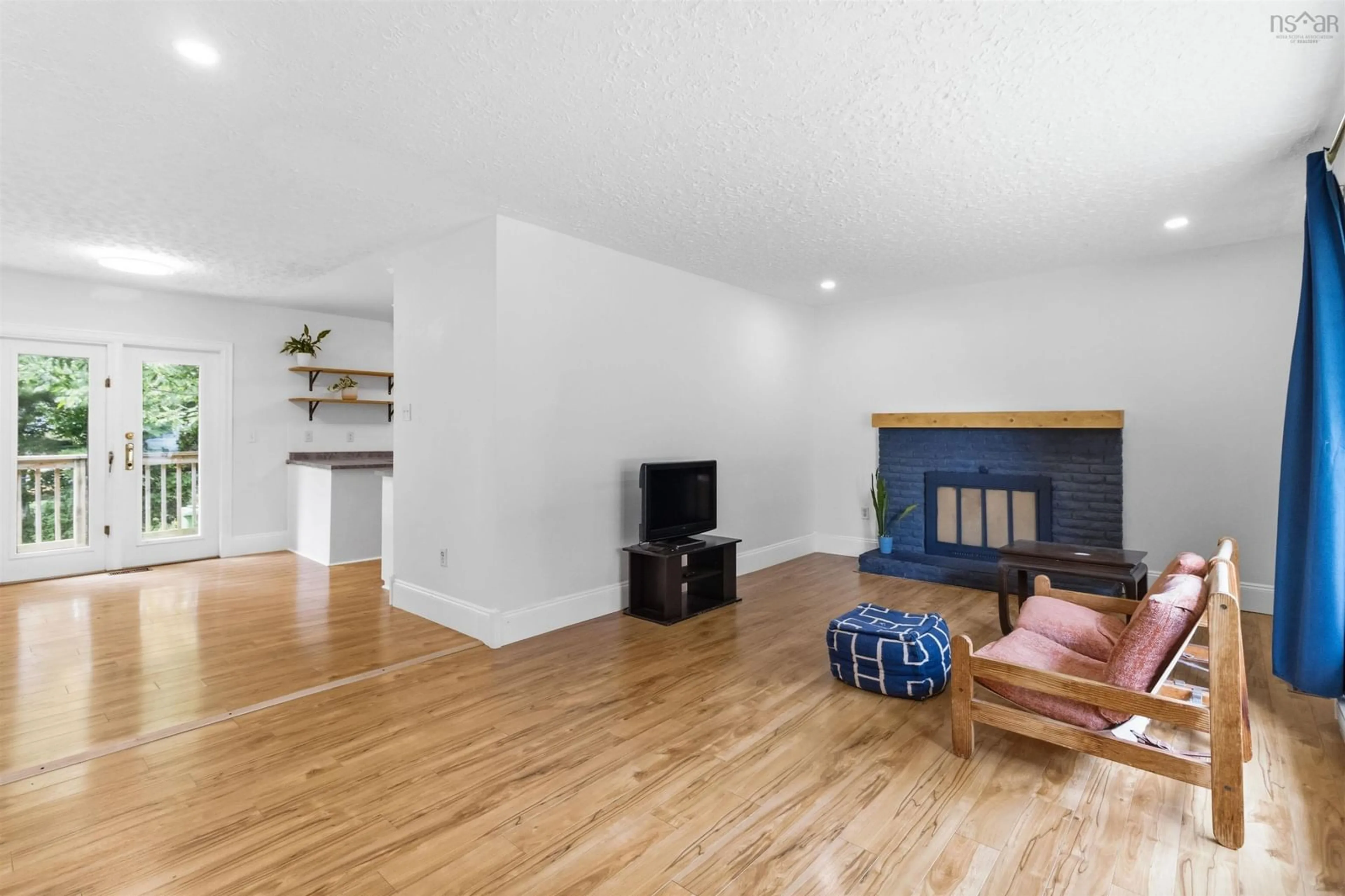Living room with furniture, wood/laminate floor for 83 Nordic Cres, Sackville Nova Scotia B4C 2E4