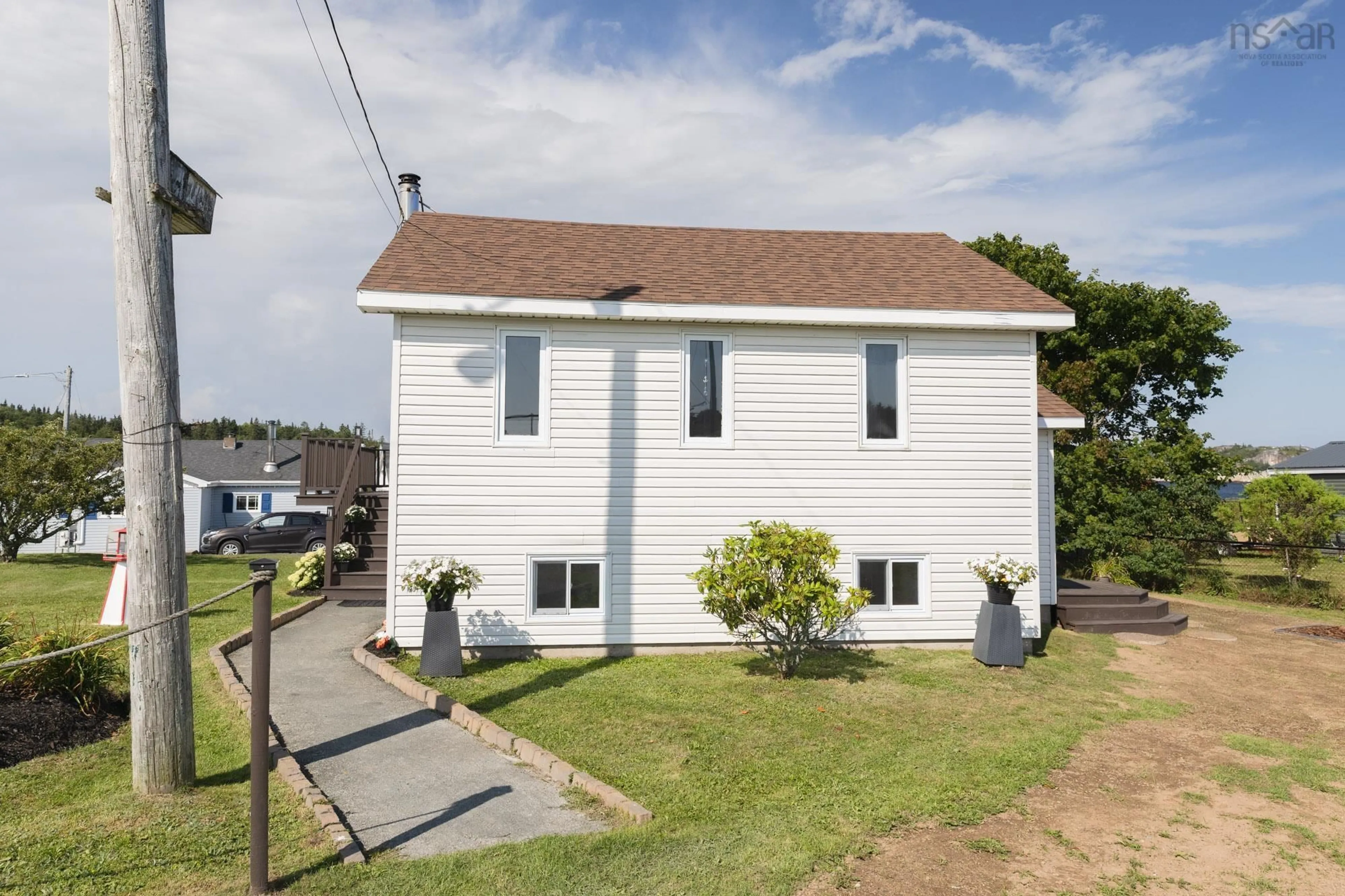 Home with vinyl exterior material, street for 17 Demers Rd, Terence Bay Nova Scotia B3T 1Y2