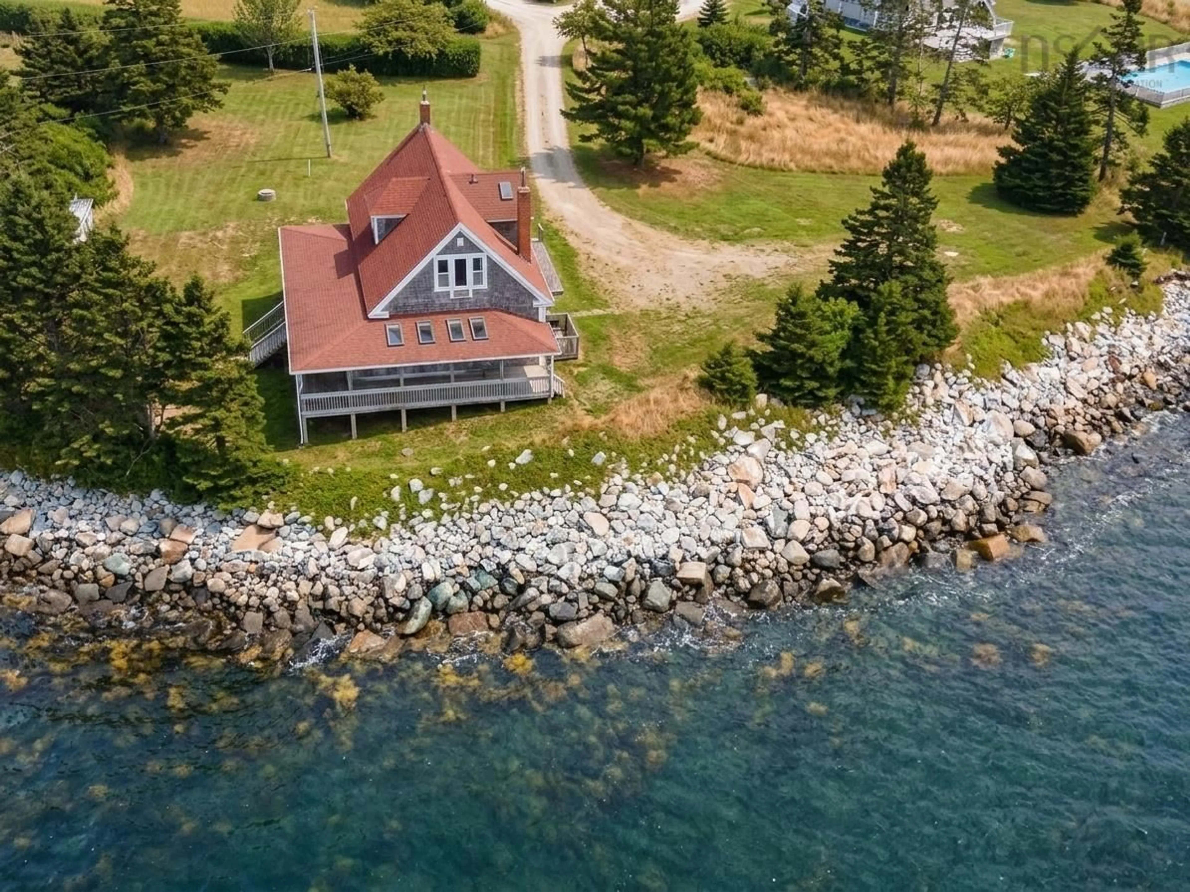 A pic from outside/outdoor area/front of a property/back of a property/a pic from drone, water/lake/river/ocean view for 3761 Highway 3, Lower Argyle Nova Scotia B0W 1W0