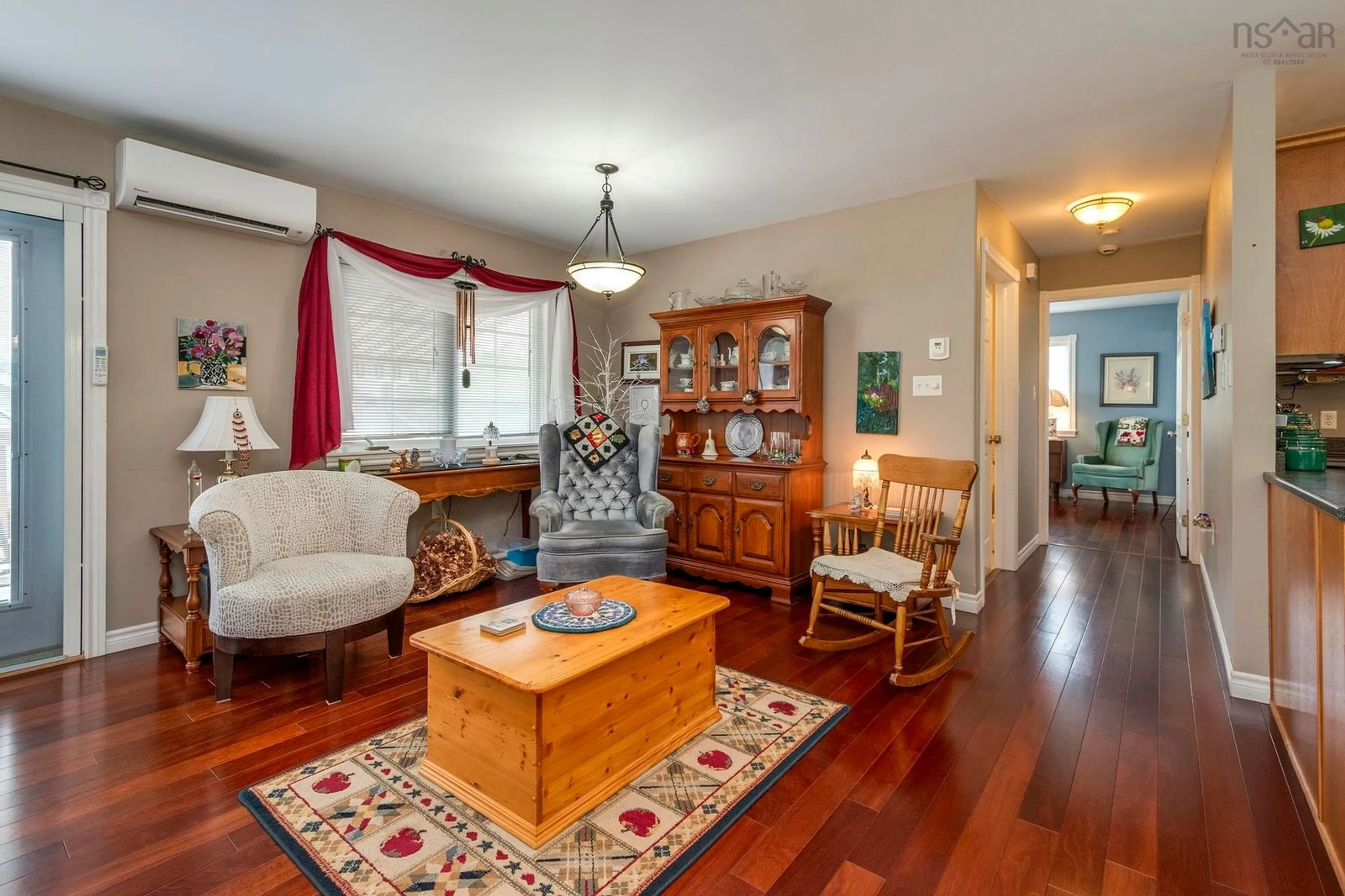 Living room with furniture, wood/laminate floor for 59 Martha St, Pictou Nova Scotia B0K 1H0