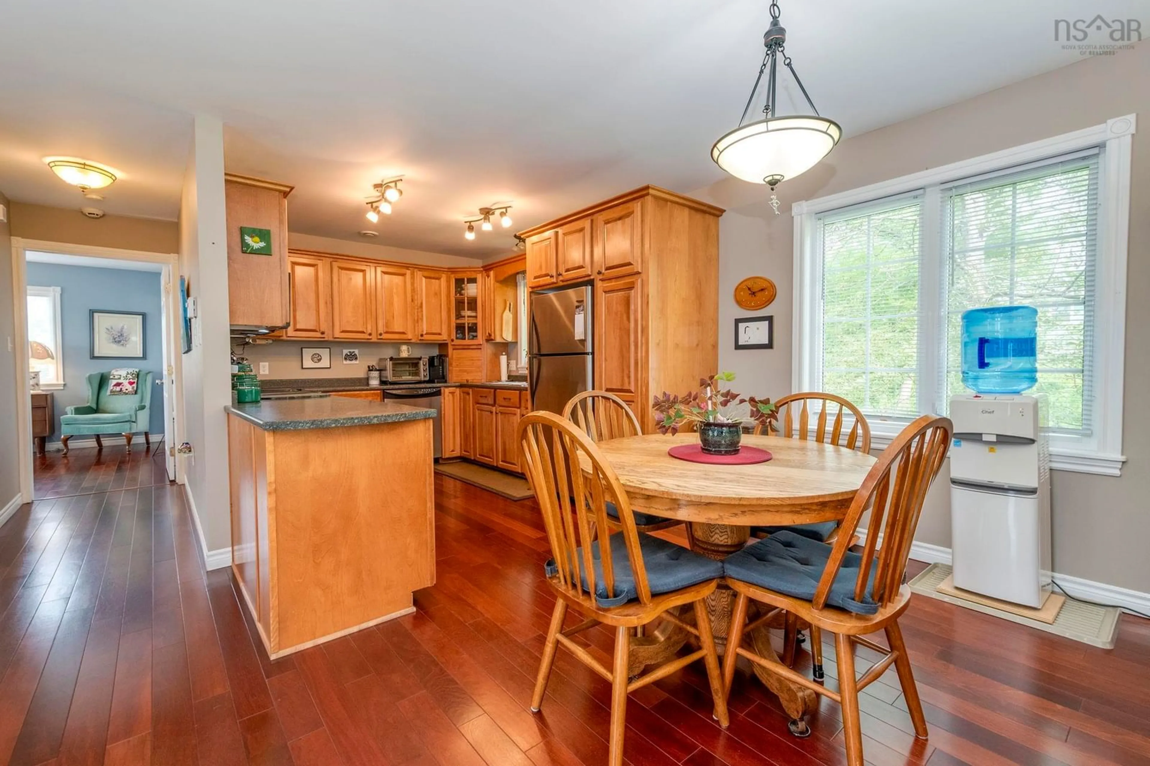 Open concept kitchen, wood/laminate floor for 59 Martha St, Pictou Nova Scotia B0K 1H0