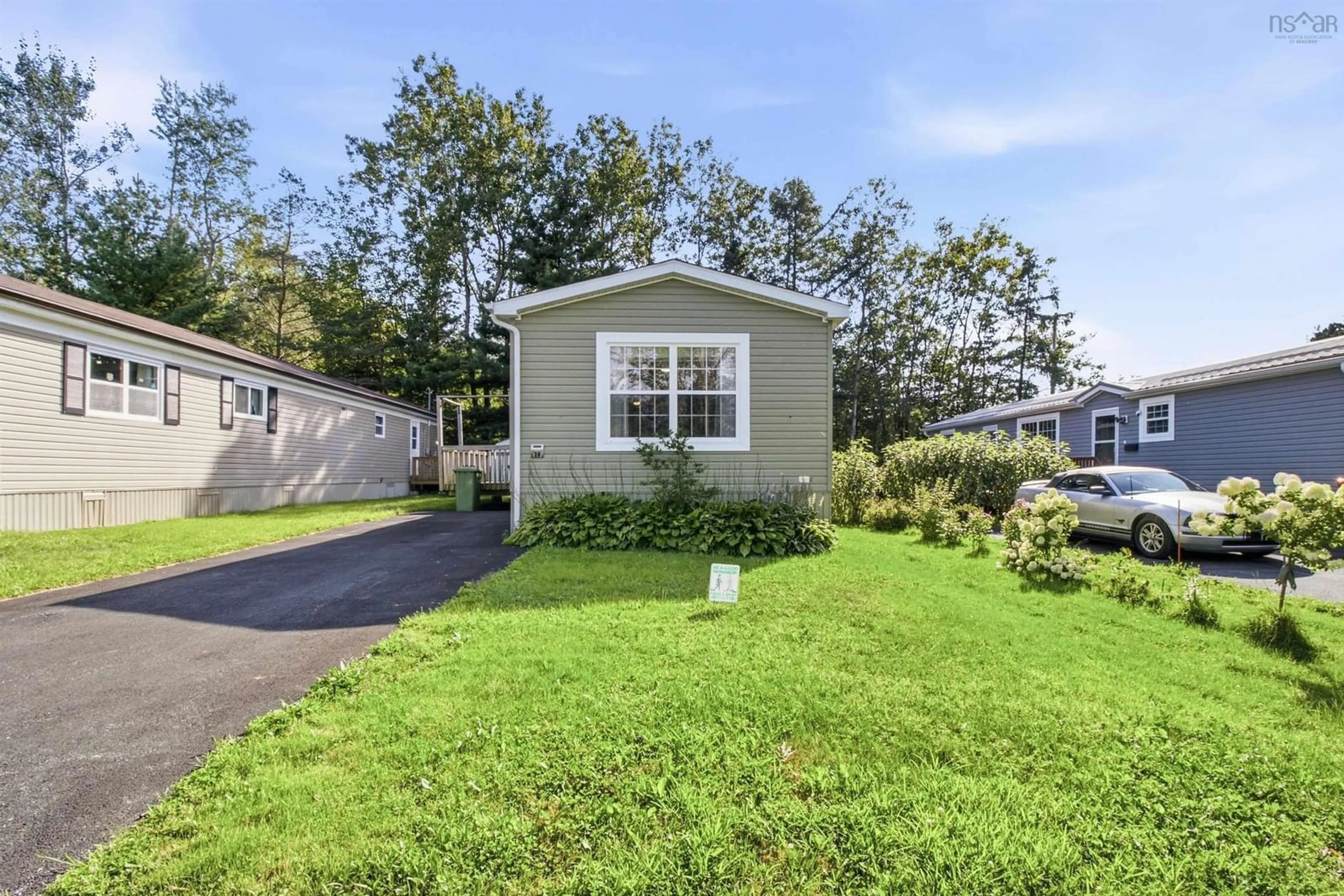 Home with vinyl exterior material, street for 20 Century St, Middle Sackville Nova Scotia B4E 1C5