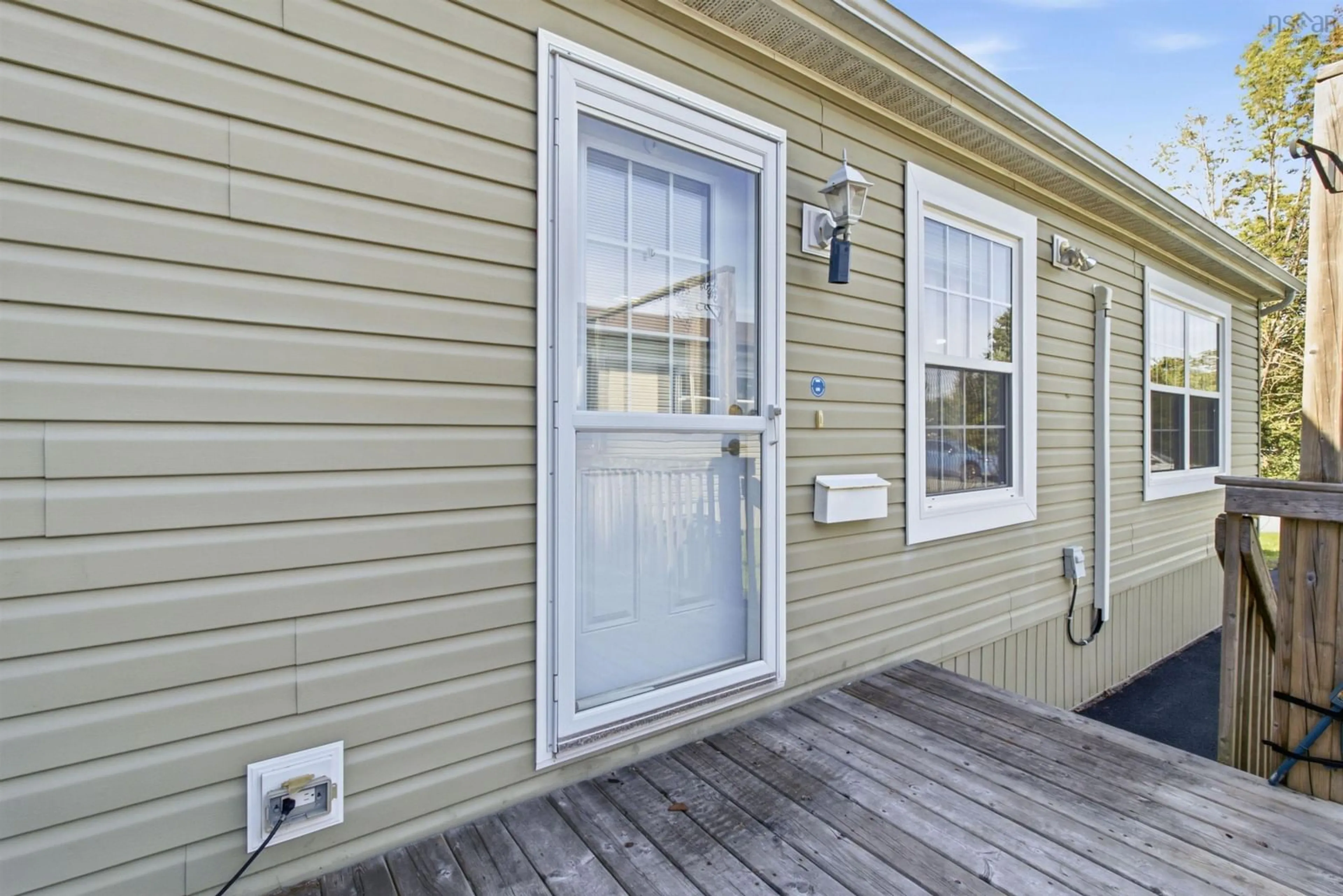 Home with vinyl exterior material, street for 20 Century St, Middle Sackville Nova Scotia B4E 1C5