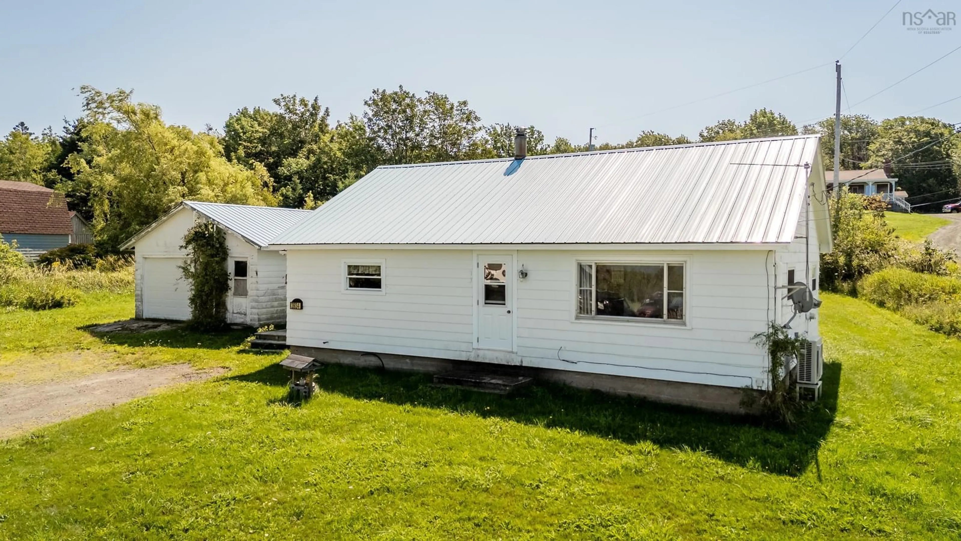 A pic from outside/outdoor area/front of a property/back of a property/a pic from drone, building for 3934 Shore Rd, Hillsburn Nova Scotia B0S 1A0