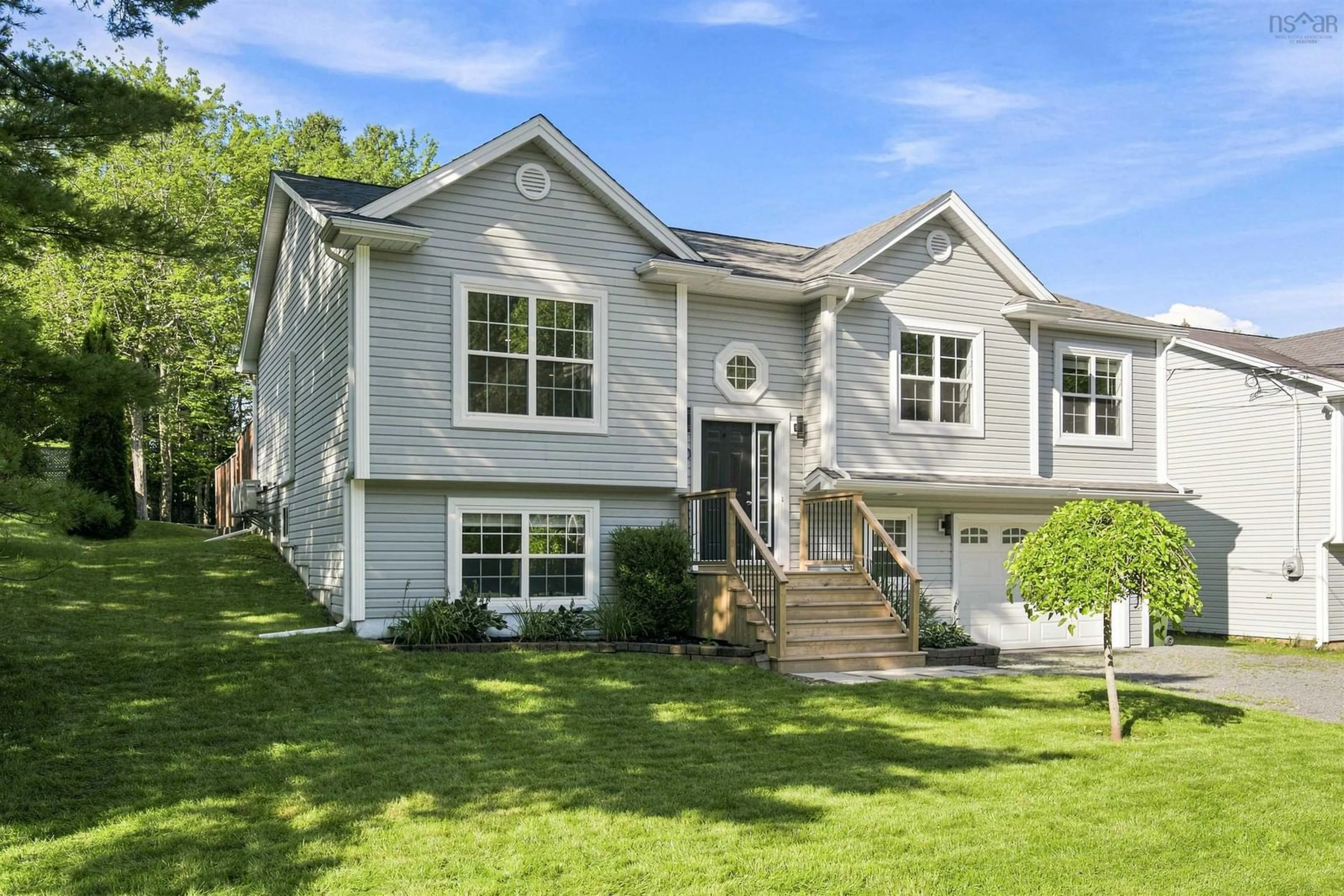 Home with vinyl exterior material, street for 20 Lakeland St, Beaver Bank Nova Scotia B4G 1A5