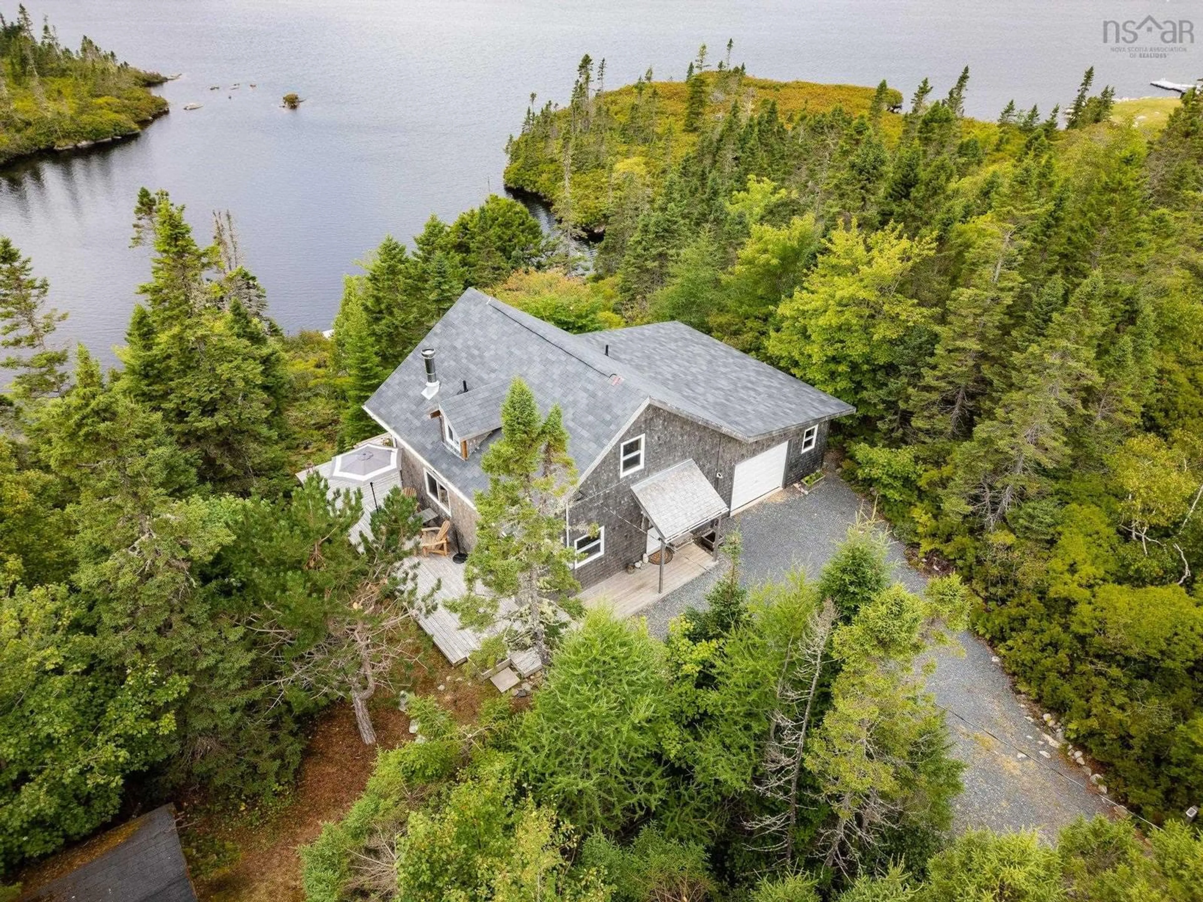 A pic from outside/outdoor area/front of a property/back of a property/a pic from drone, water/lake/river/ocean view for 14 Big Lake Dr, Big Lake Nova Scotia B3Z 3X6