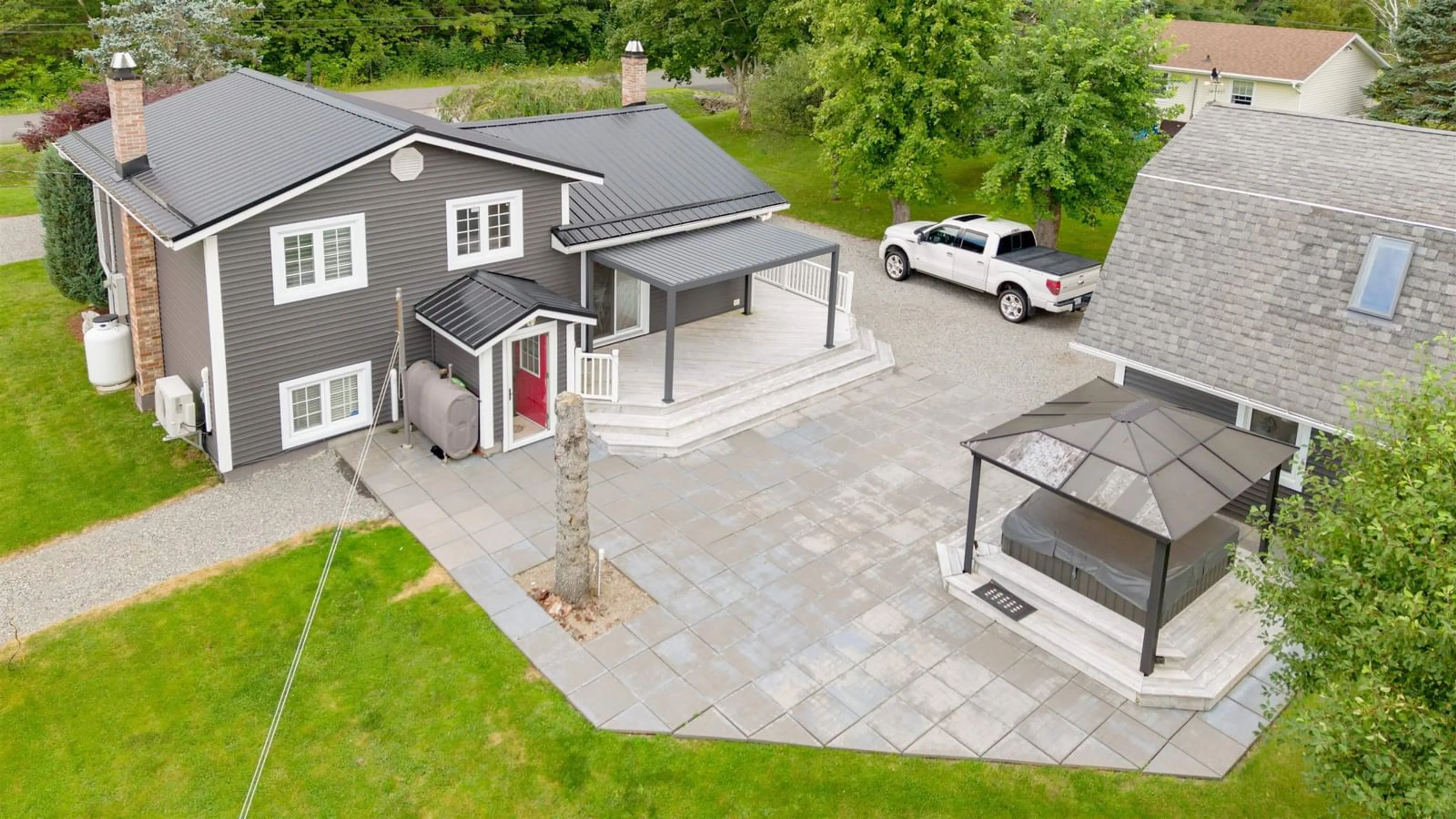 A pic from outside/outdoor area/front of a property/back of a property/a pic from drone, street for 143 Sunrise Dr, Georges River Nova Scotia B1Y 3B6