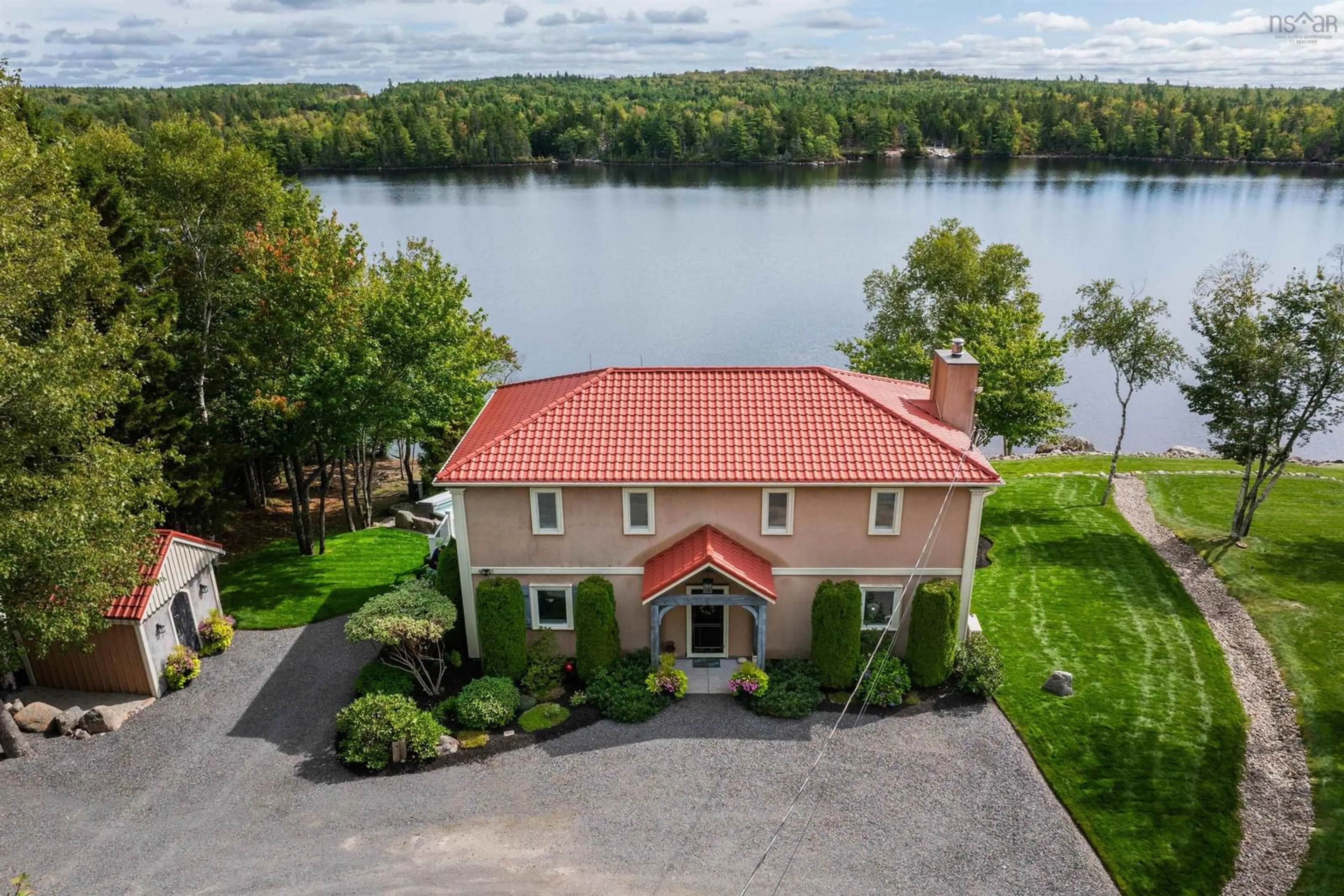 A pic from outside/outdoor area/front of a property/back of a property/a pic from drone, water/lake/river/ocean view for 154 Spruce Drive Dr, Aylesford Lake Nova Scotia B0P 1C0